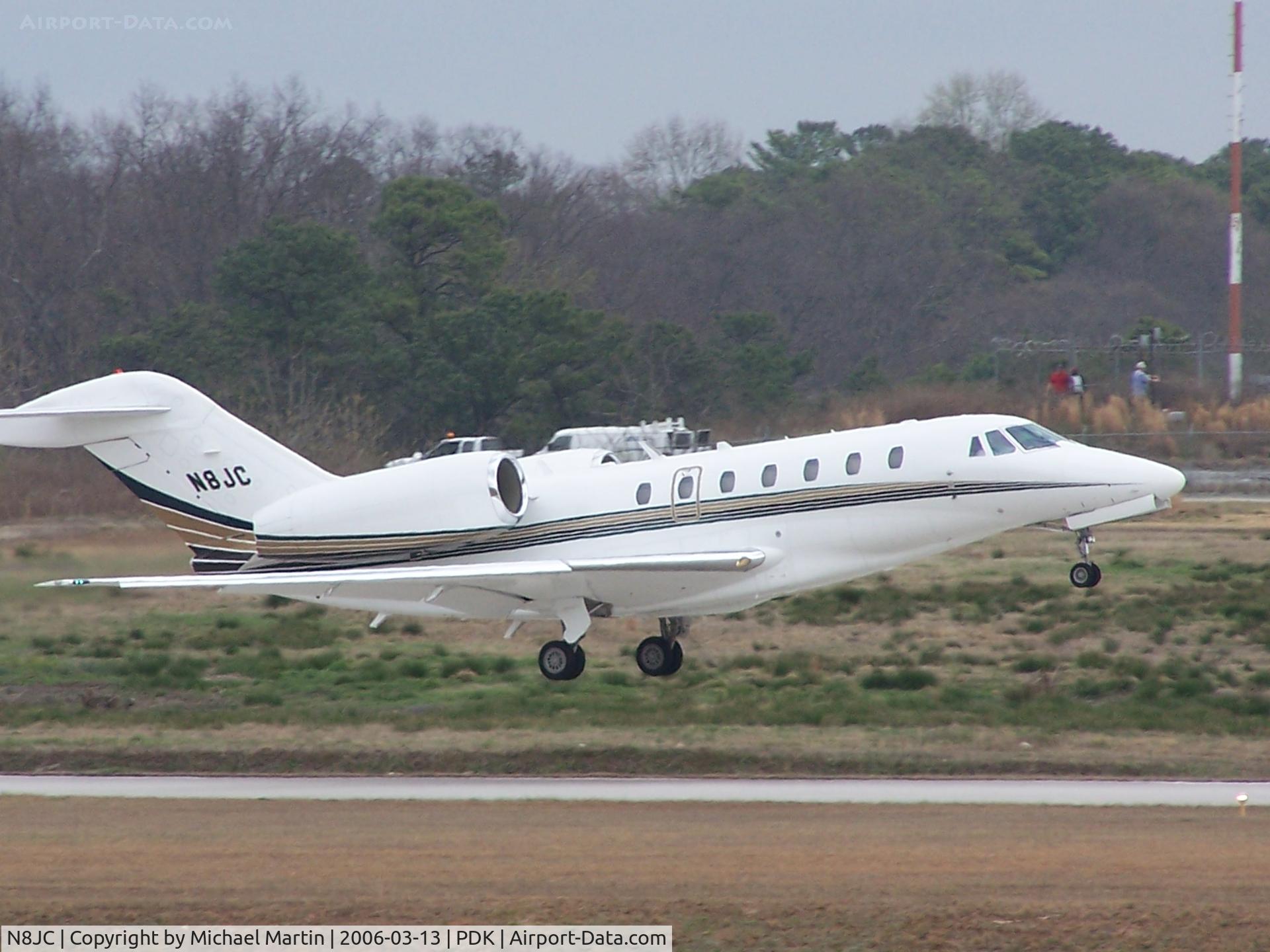 N8JC, 2001 Cessna 750 Citation X Citation X C/N 750-0154, Departing PDK - Starting to rotate gear.