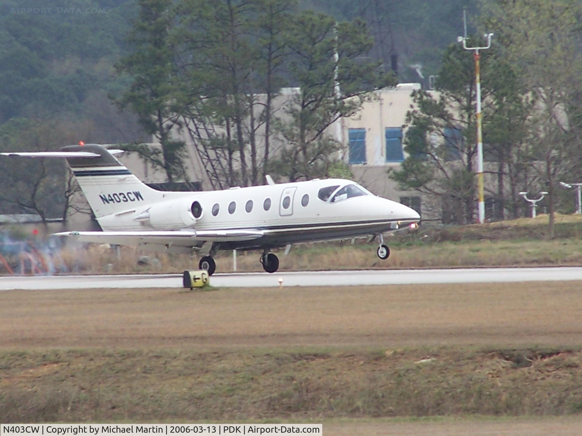 N403CW, 1995 Beechcraft 400A Beechjet C/N RK-103, Landing PDK on 20L