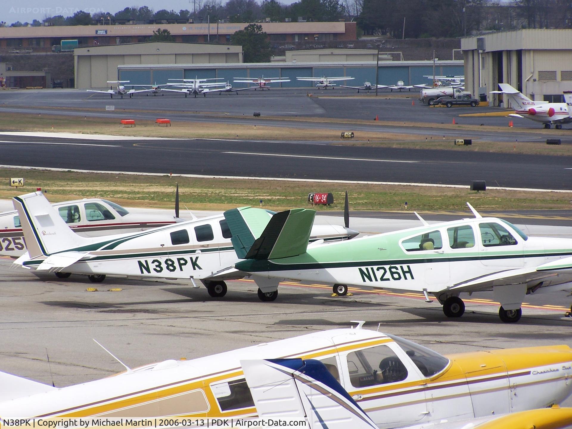 N38PK, 1987 Beech B36TC Bonanza C/N EA-467, Tied down with some not so impressive company!