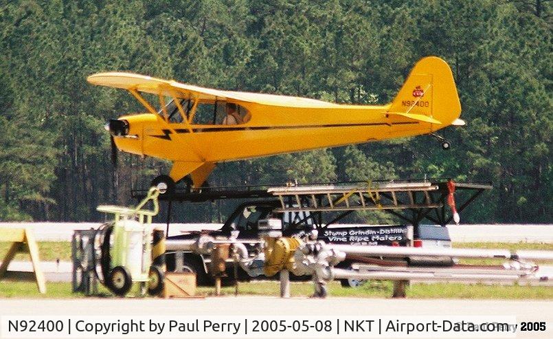 N92400, 1946 Piper J3C-65 Cub Cub C/N 16862, Not just a touch-and-go on a moving truck, he rides it out!