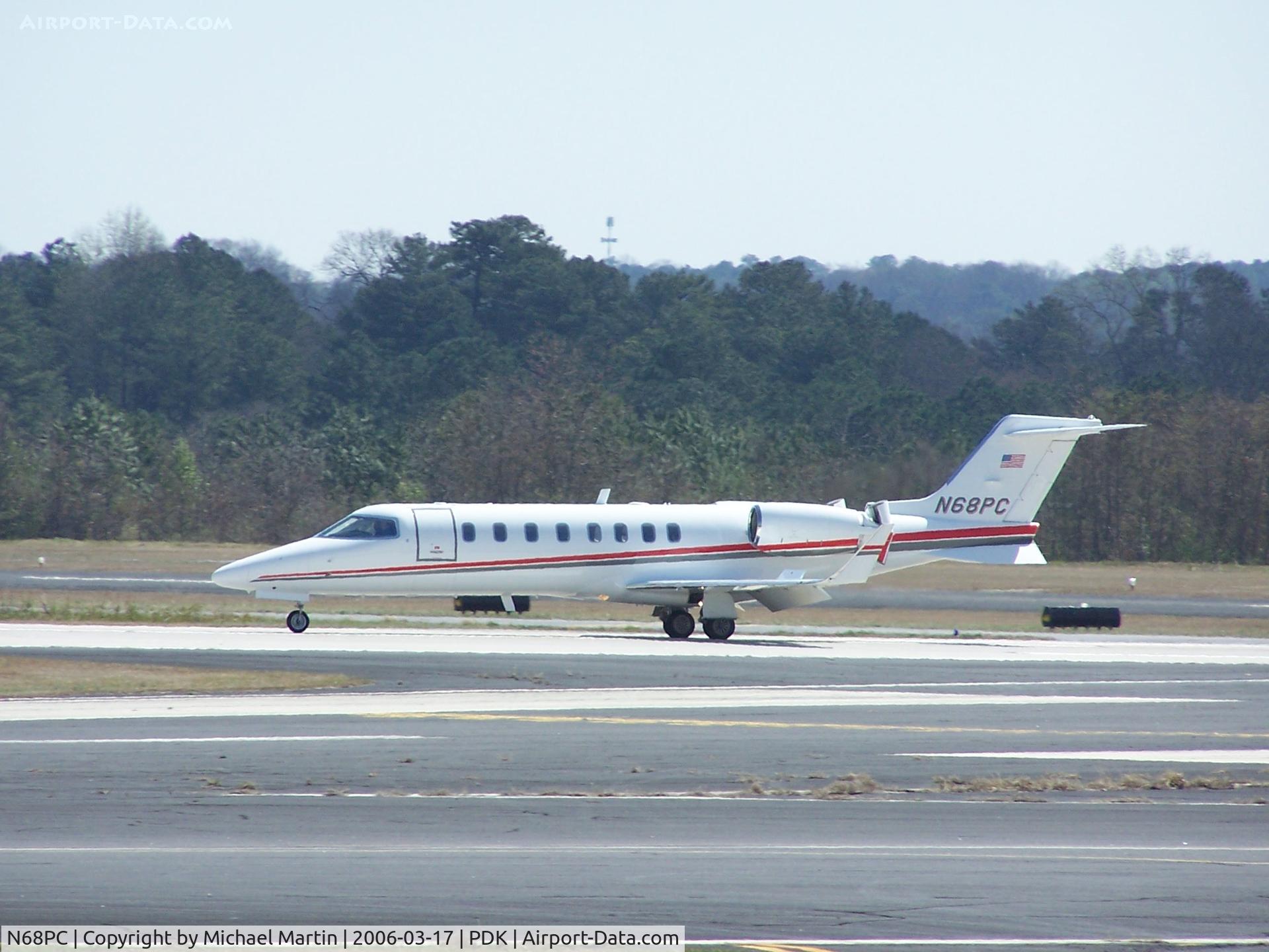 N68PC, Learjet 45 C/N 289, Landing PDK on 20R with airbrakes extended