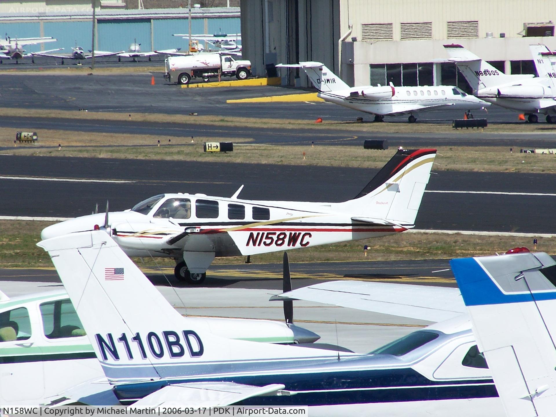 N158WC, 2001 Raytheon Aircraft Company 58 C/N TH-2008, Taxing to Epps Air Service