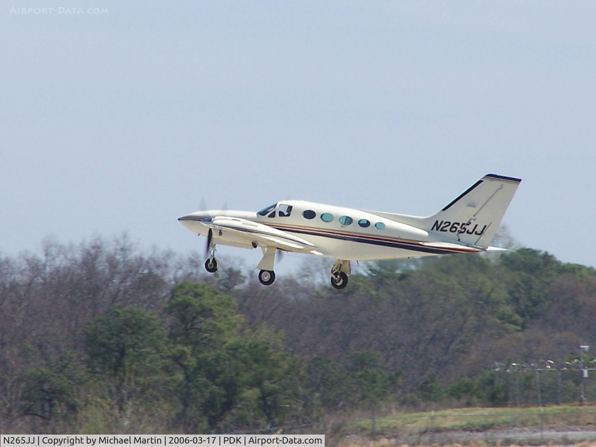 N265JJ, Cessna 421C Golden Eagle C/N 421C0822, Departing PDK - Starting to rotate gear.
