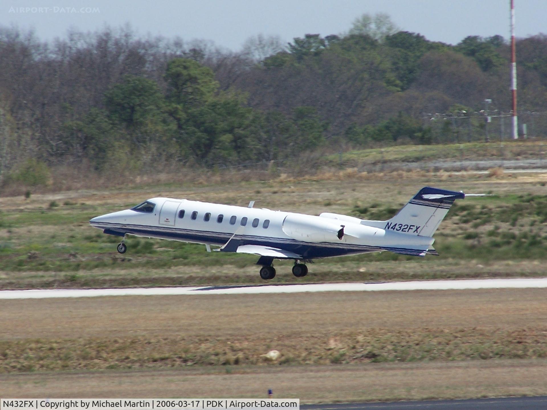 N432FX, 2002 Learjet Inc 45 C/N 197, Departing PDK