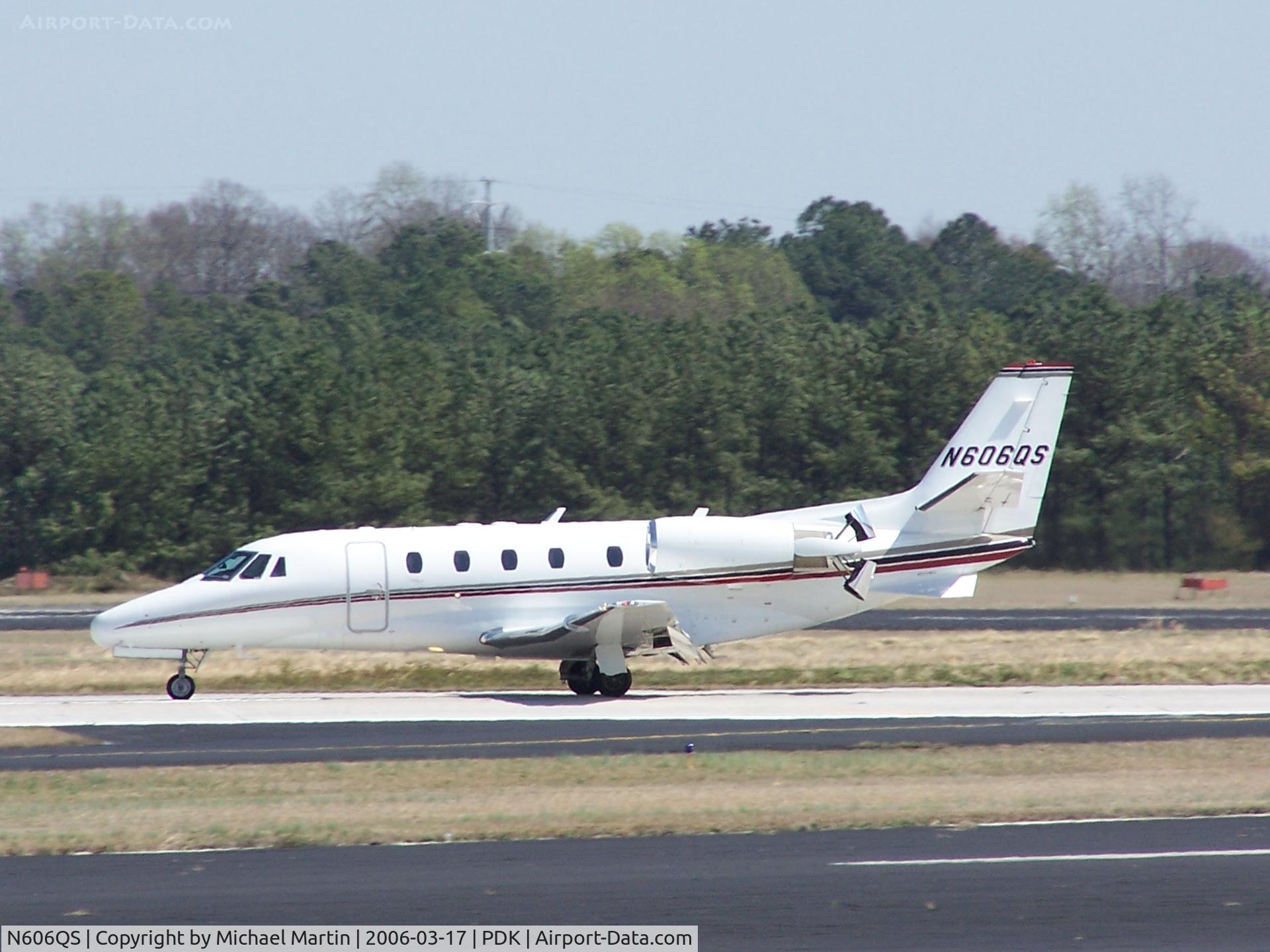 N606QS, 2003 Cessna 560XL Citation Excel C/N 560-5338, NetJet landing PDK