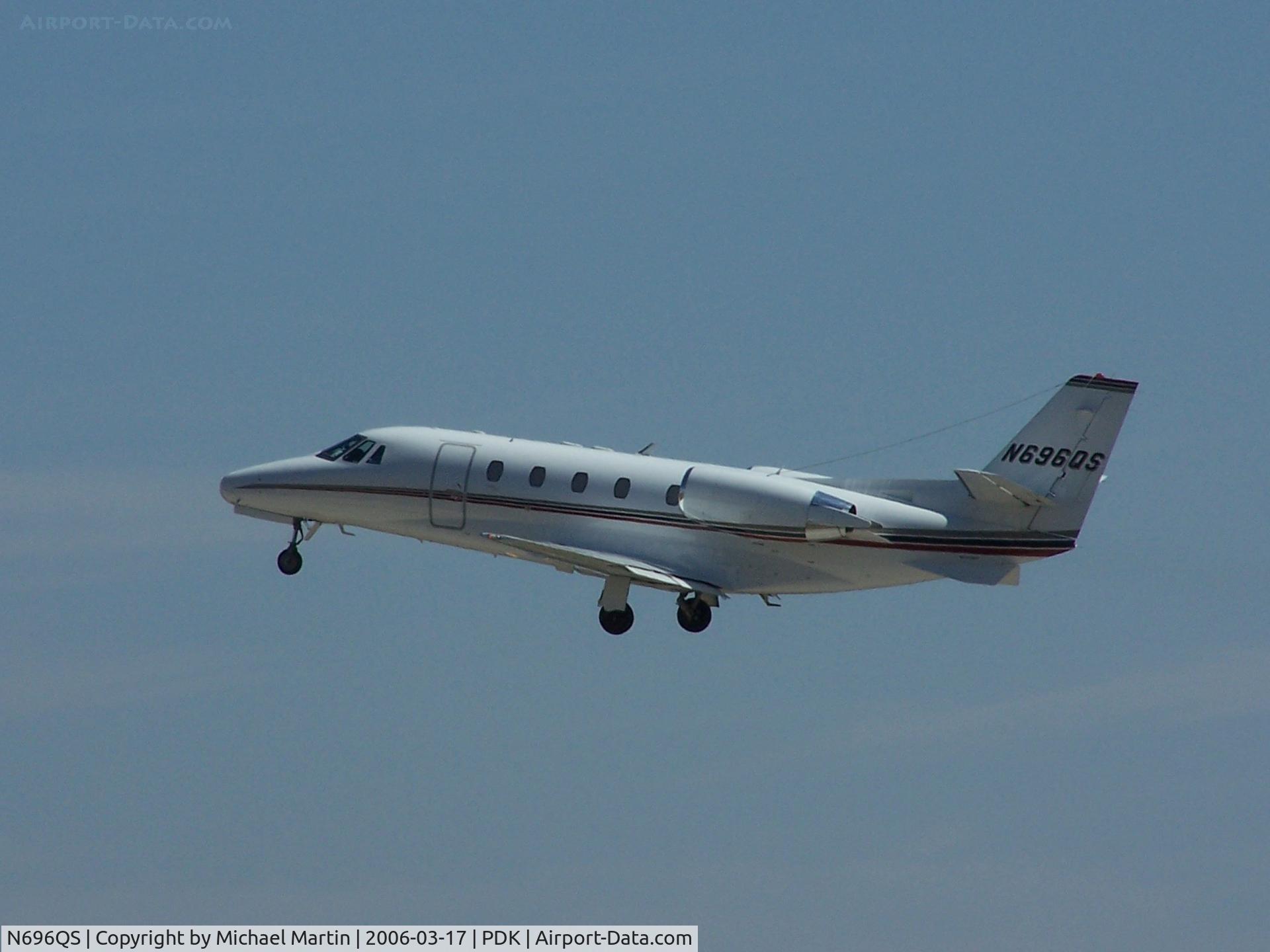 N696QS, 2002 Cessna 560XL Citation Excel C/N 560-5296, NetJets departing PDK