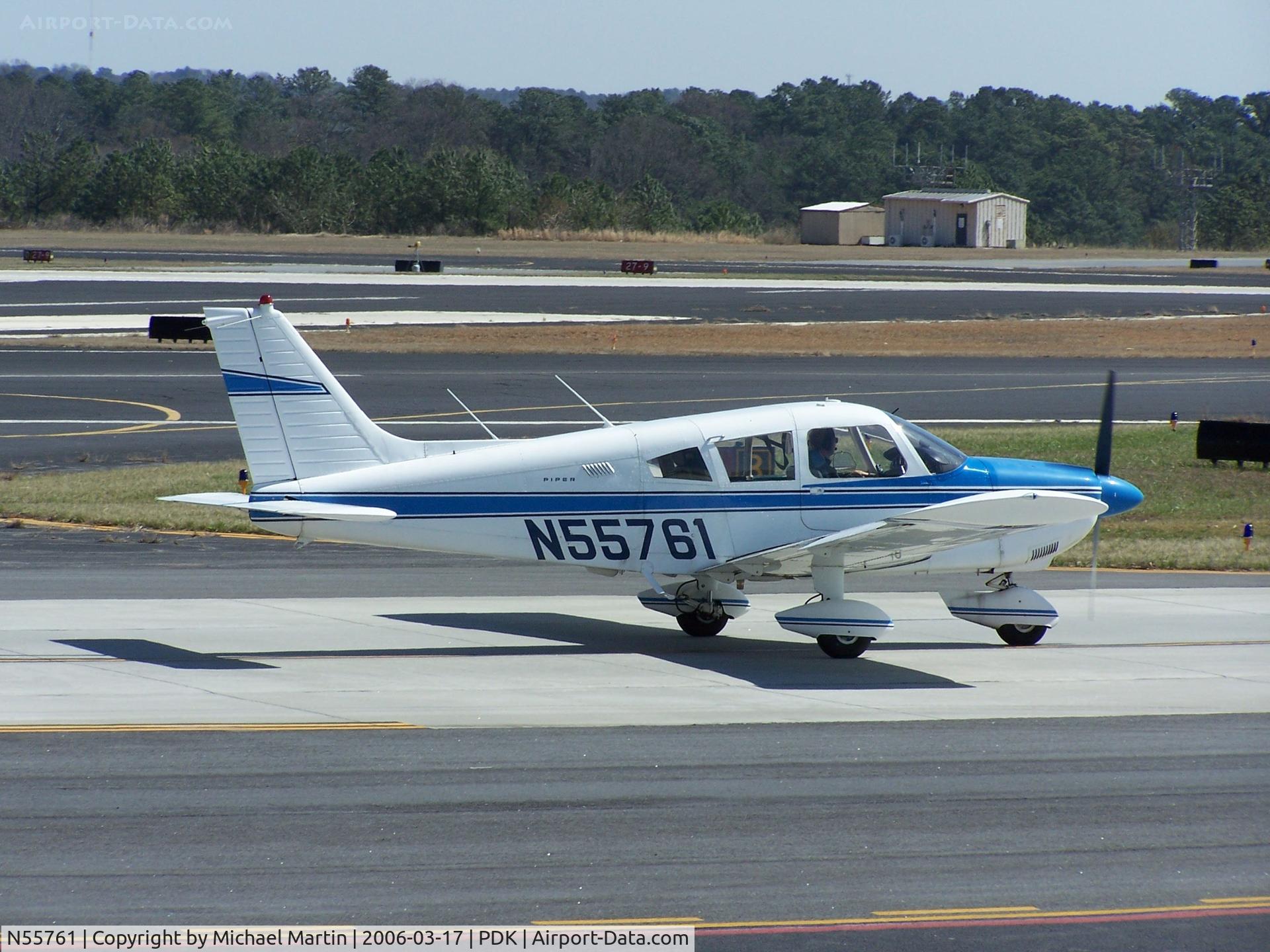 N55761, 1973 Piper PA-28-180 C/N 28-7305462, Taxing to Runway 20L