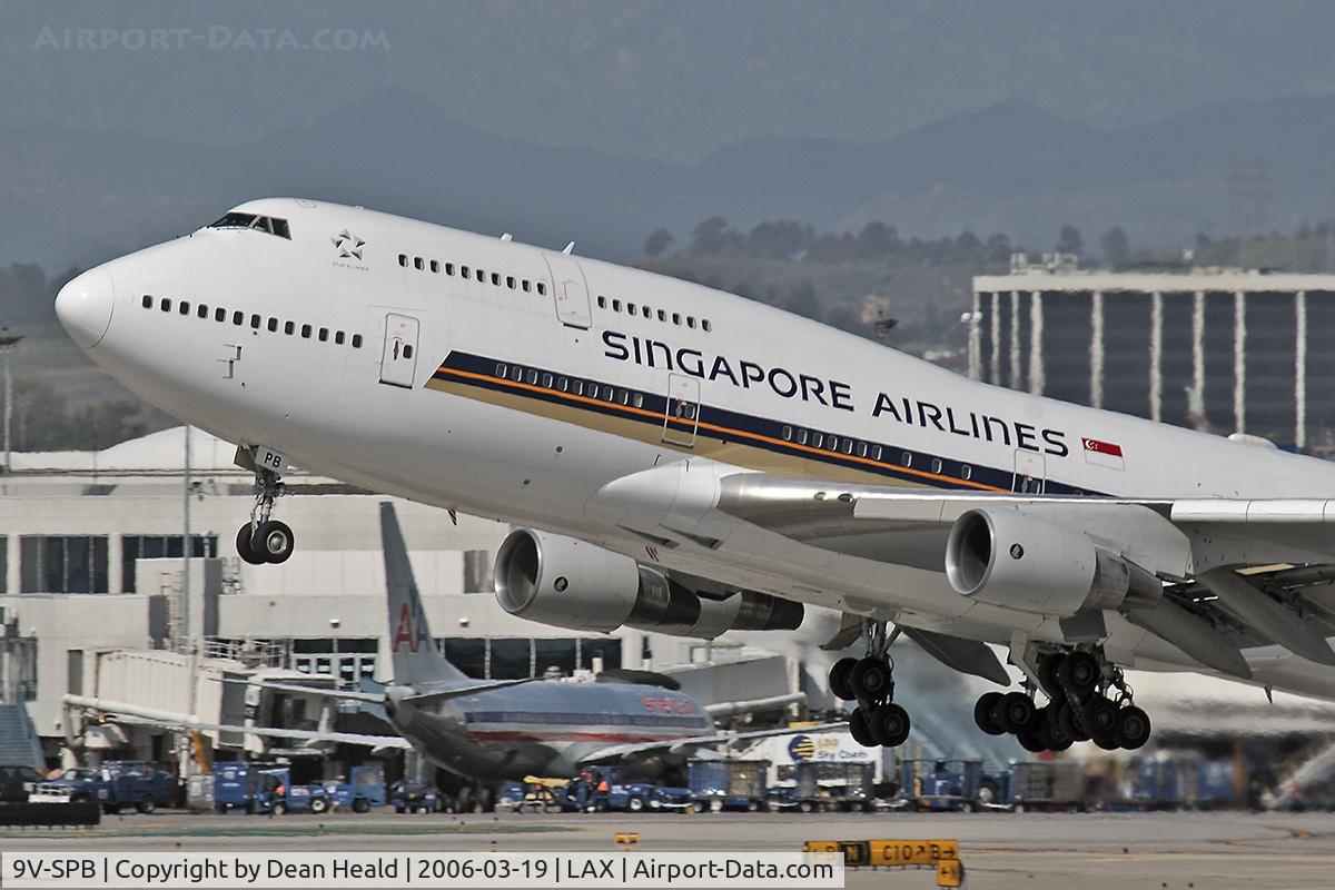 9V-SPB, 1994 Boeing 747-412 C/N 26551, Close-up of Singapore Airlines 9V-SPB (Boeing 747-412) - FLT SIA11 - departing LAX RWY 25R enroute to Narita International Airport (RJAA), Japan.