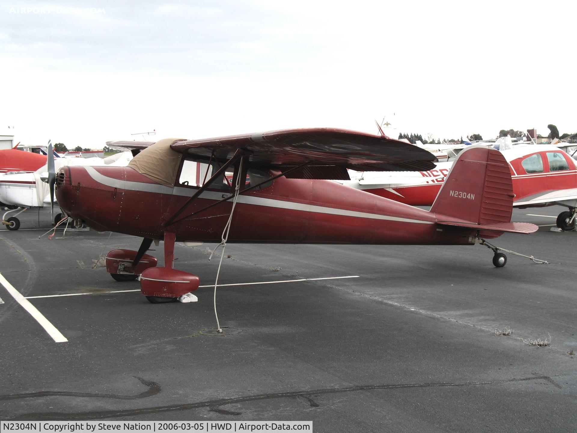 N2304N, 1947 Cessna 140 C/N 12544, 1955 Cessna 140 at stormy Hayward Air Terminal, CA