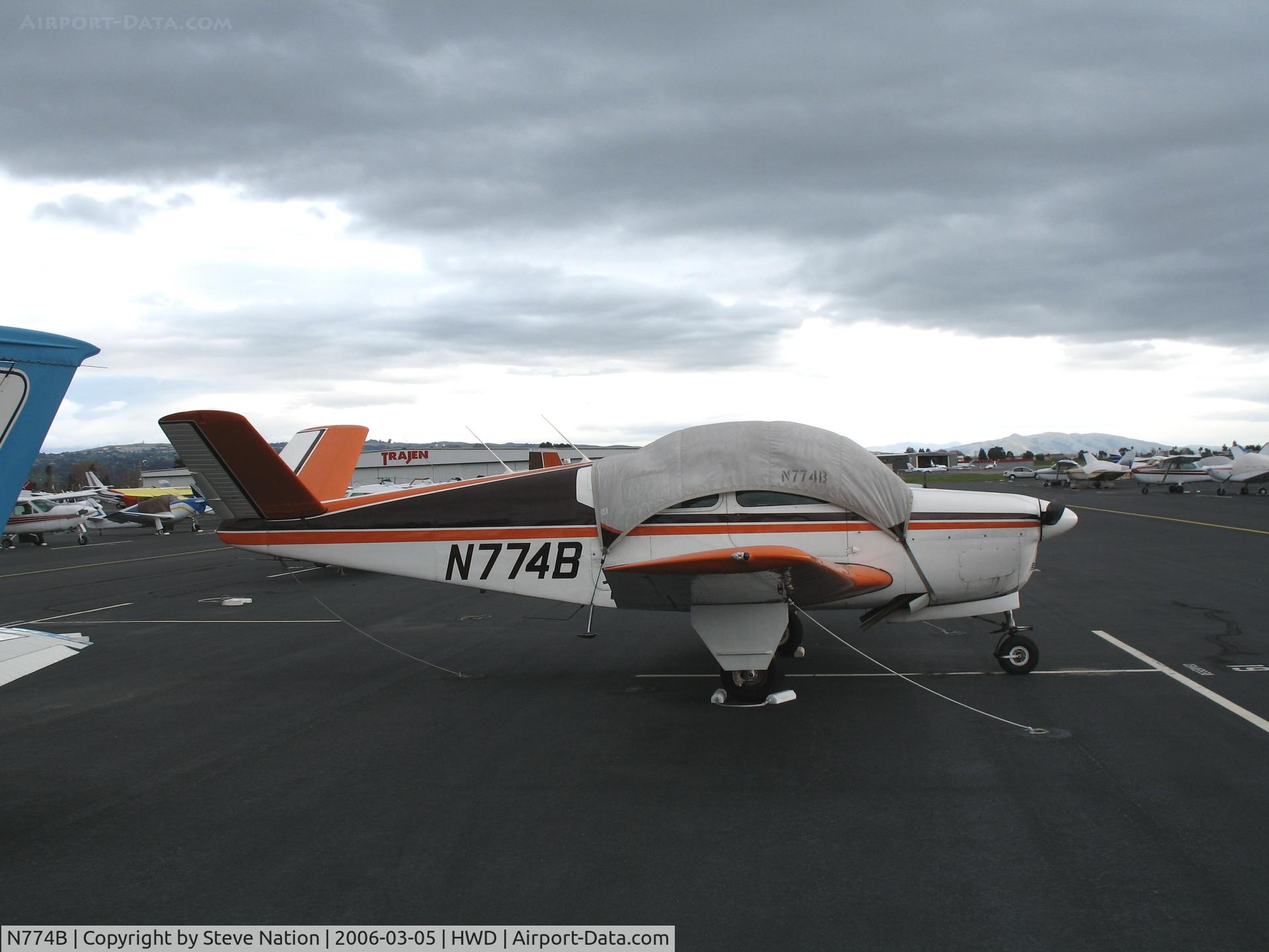 N774B, 1948 Beech A35 Bonanza C/N D-1784, 1956 Beech A35 at stormy Hayward Air Terminal, CA