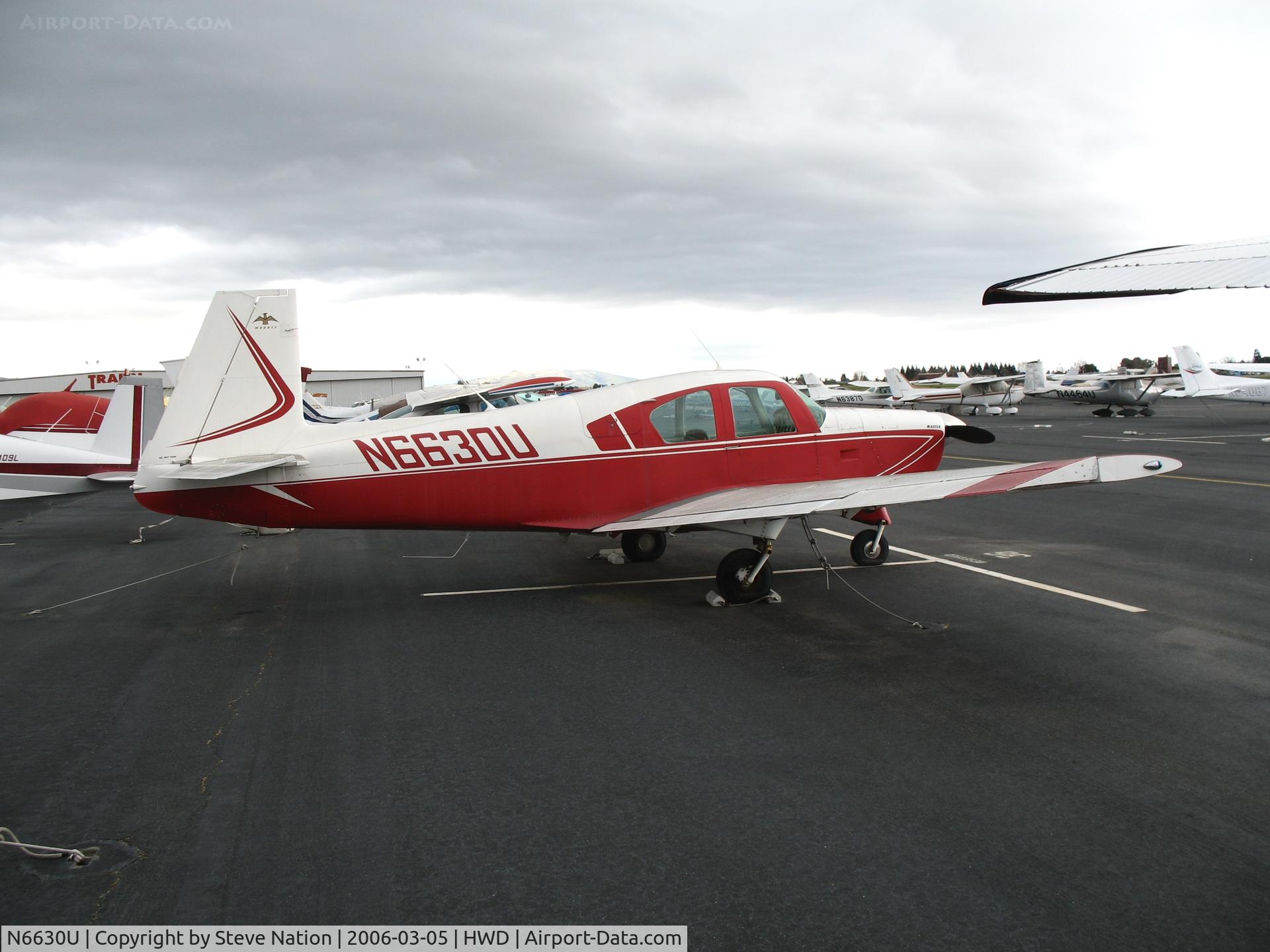 N6630U, 1963 Mooney M20D Master C/N 125, 1963 Mooney M20D at stormy Hayward Air Terminal, CA