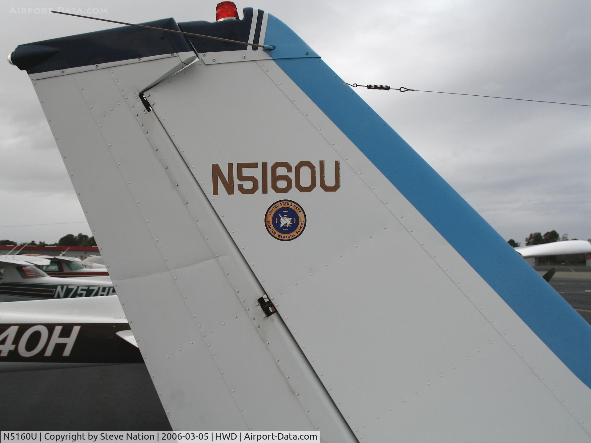 N5160U, 1980 Cessna 172RG Cutlass RG C/N 172RG0266, Top Gun logo on 172RG at stormy Hayward Air Terminal, CA