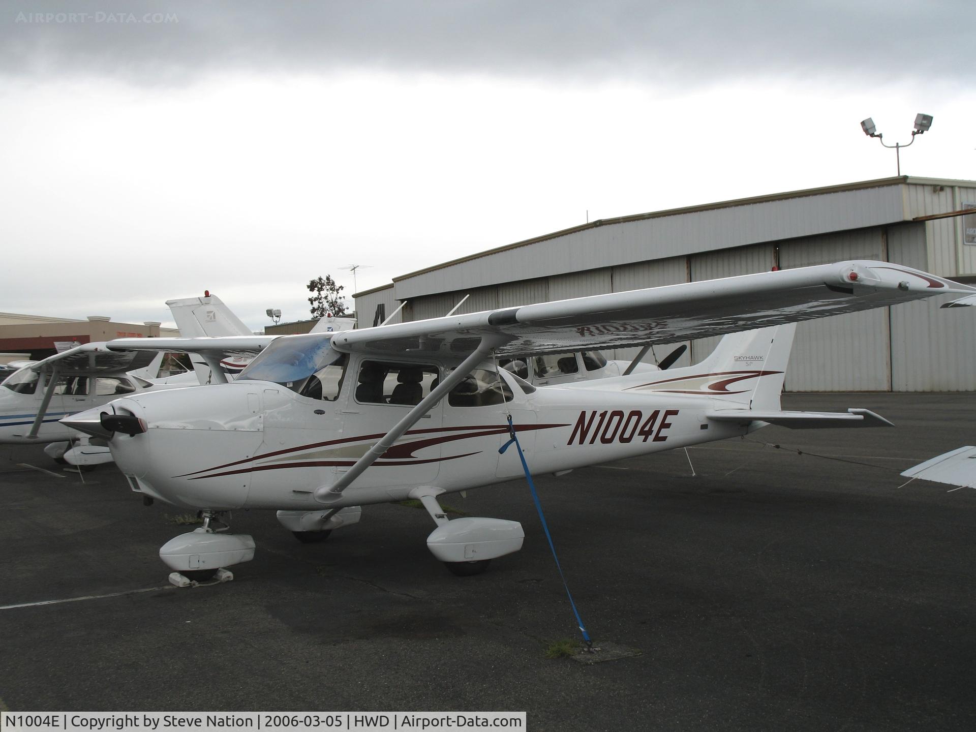 N1004E, 2005 Cessna 172S Skyhawk SP C/N 172S9872, Brand new 2005 Cessna 172S at stormy Hayward Air Terminal, CA