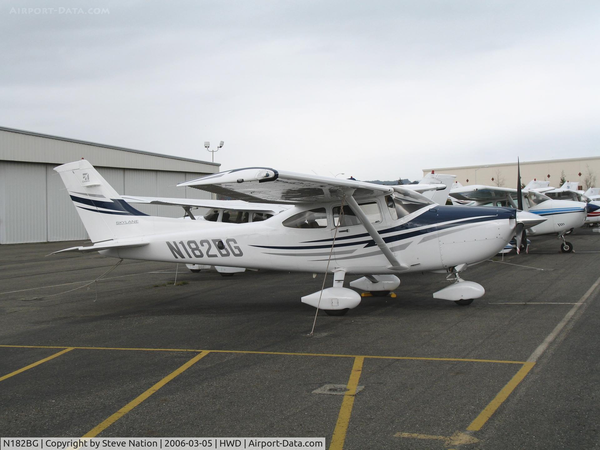 N182BG, 2005 Cessna 182T Skylane C/N 18281536, Spanking new 2006 Cessna 182T at stormy Hayward Air Terminal, CA