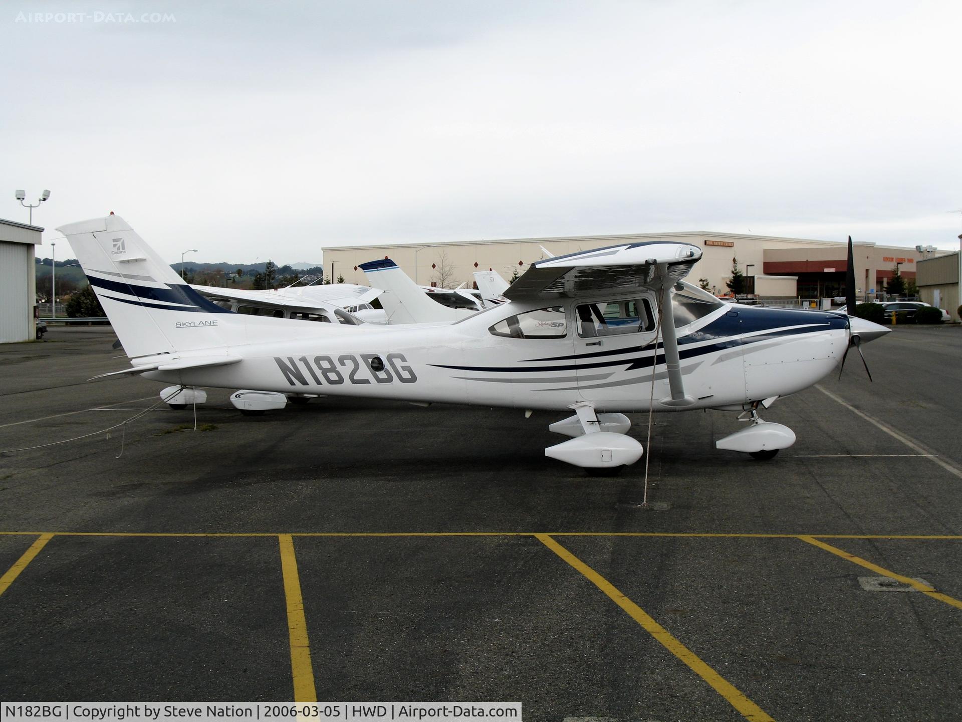 N182BG, 2005 Cessna 182T Skylane C/N 18281536, Spanking new 2006 Cessna 182T at stormy Hayward Air Terminal, CA