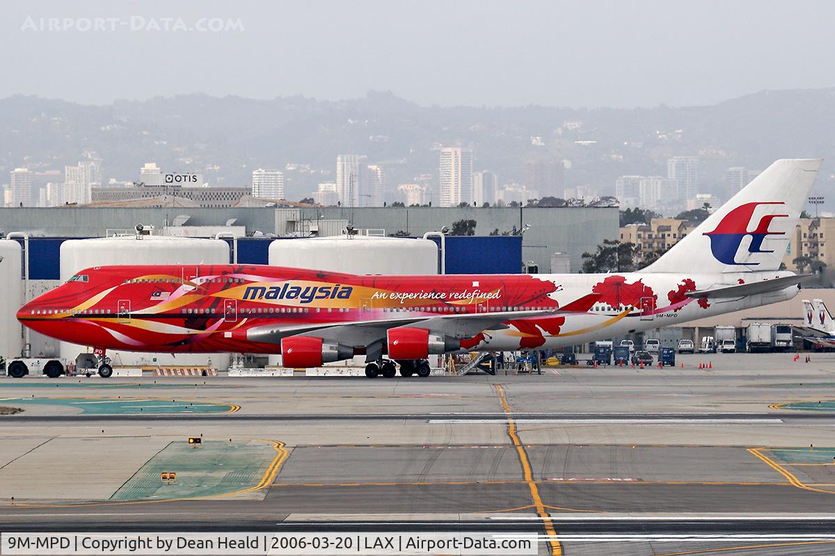 9M-MPD, 1993 Boeing 747-4H6 C/N 25701, Malaysia 9M-MPD (Boeing 747-4H6) being towed to the west terminals.