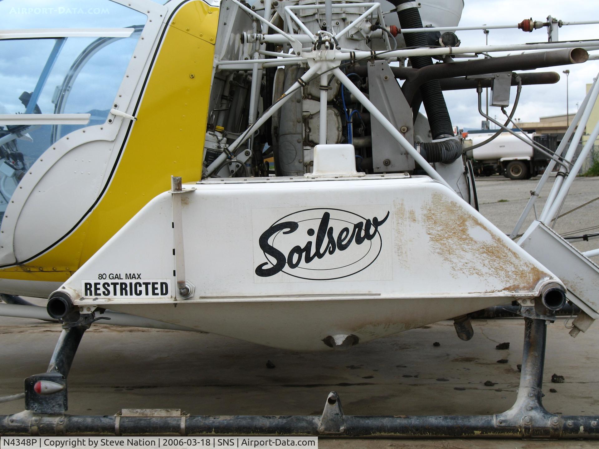 N4348P, Bell 47G-5A C/N 25059, Close-up of tank and Soilserv titles on Bell 47G-5 sprayer at Salinas, CA