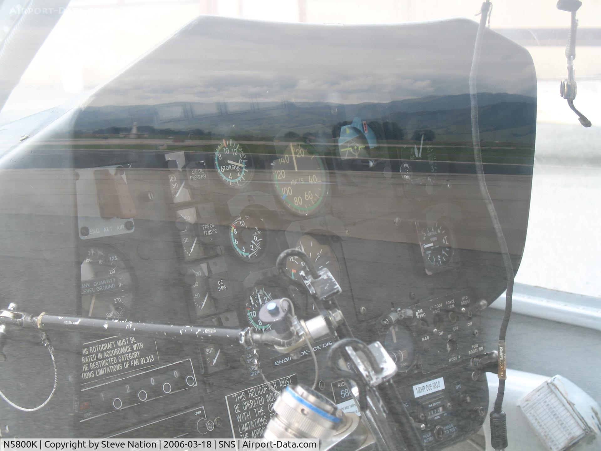 N5800K, 1971 Bell OH-58A C/N 71-20843, Close-up of cockpit R & B Helicopters 1971 Bell OH-58A (71-20843) sprayer at Salinas, CA