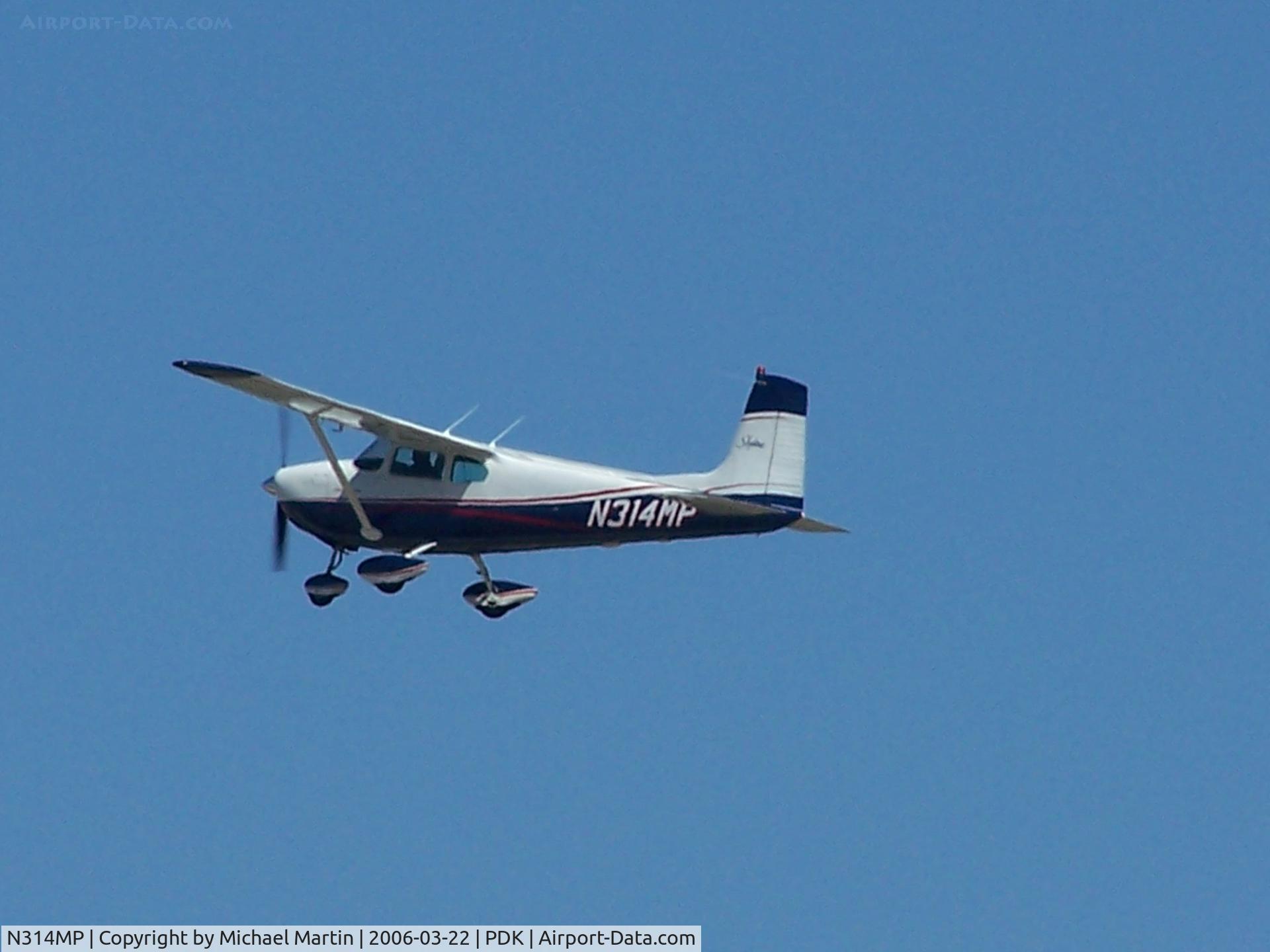 N314MP, 1958 Cessna 182B Skylane C/N 51634, Departing PDK on 2R