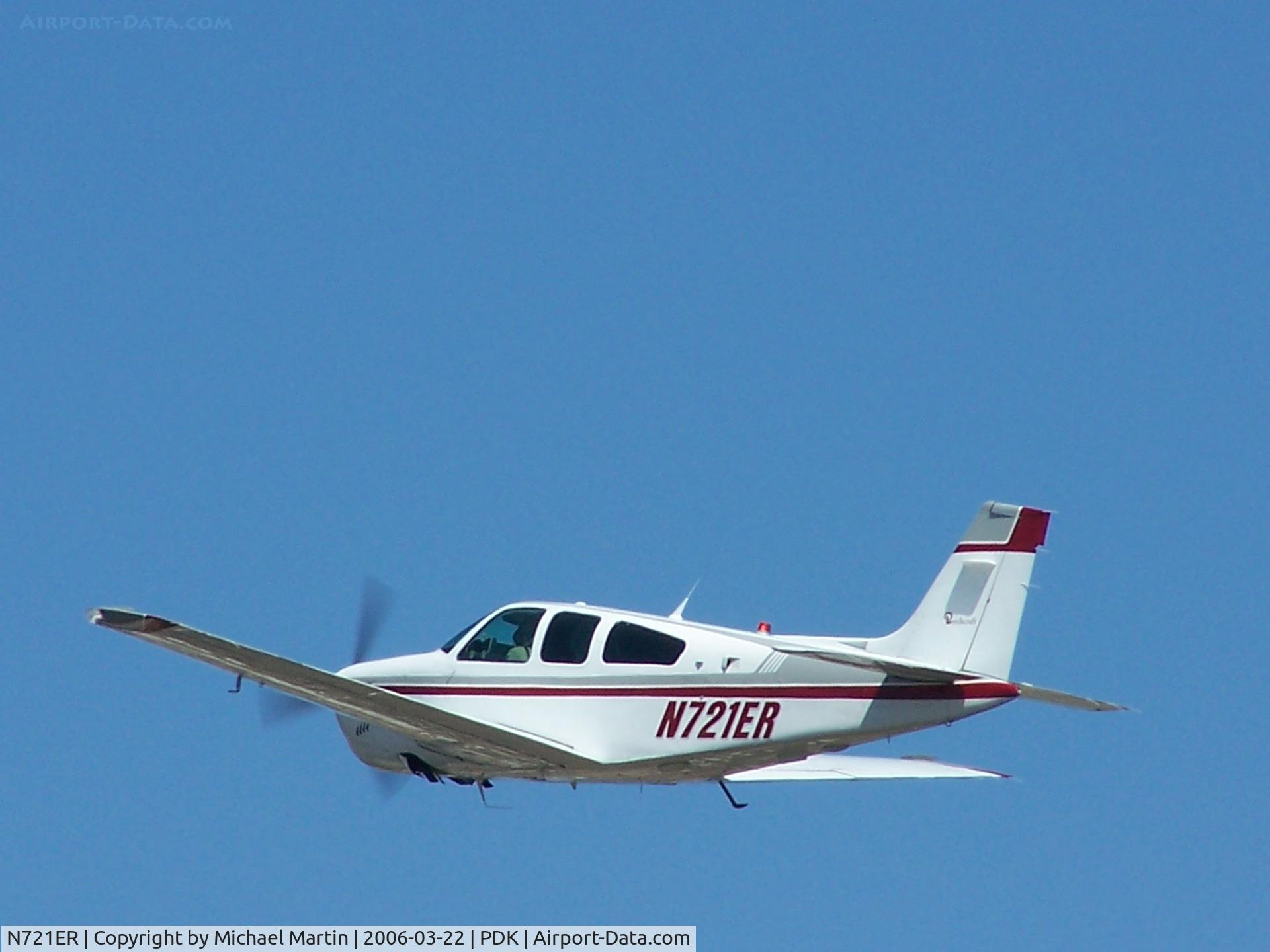 N721ER, 1988 Beech F33A Bonanza C/N CE-1295, Departing PDK - Gear Up!