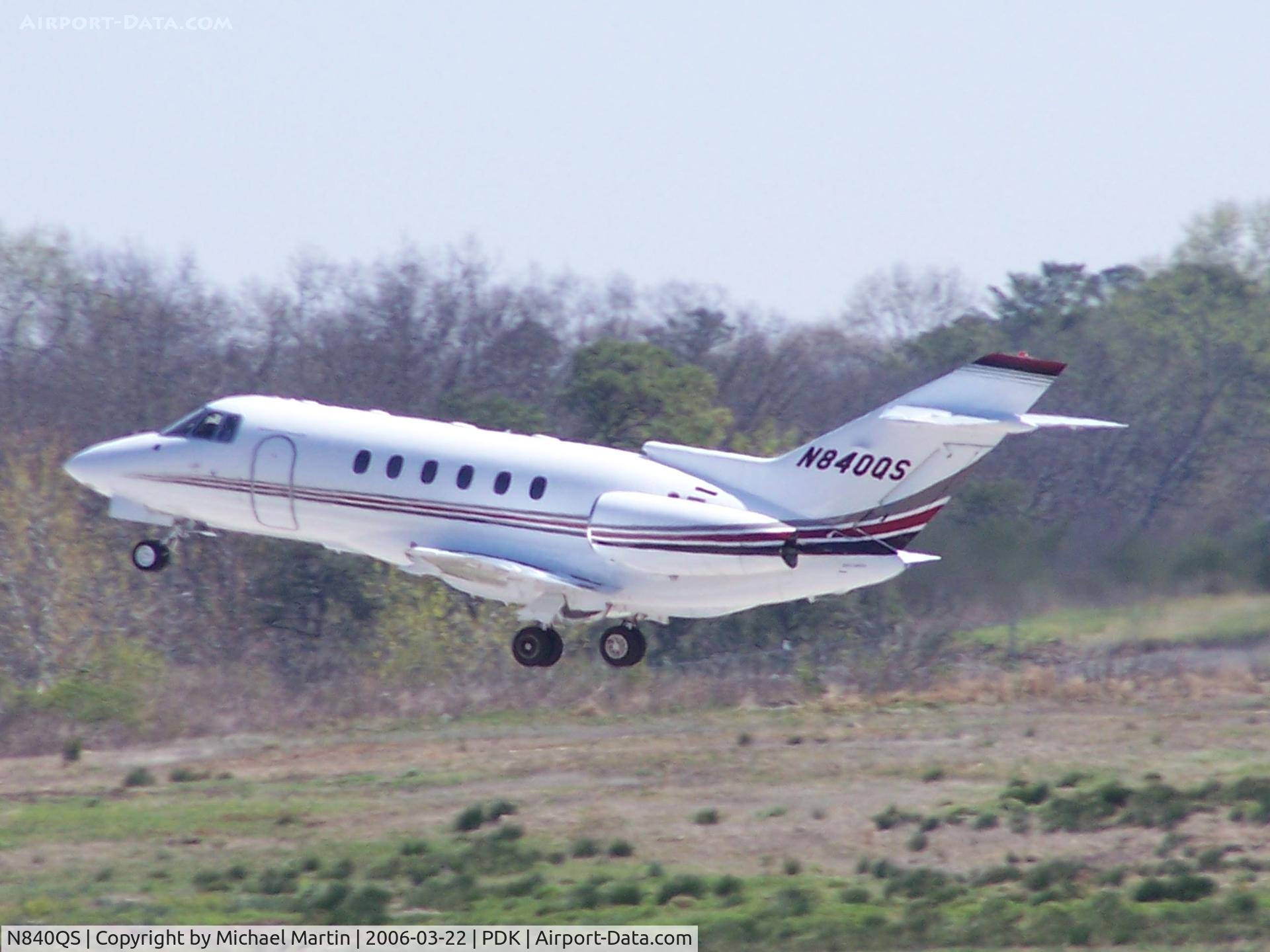 N840QS, 1997 Raytheon Hawker 800XP C/N 258340, Departing PDK