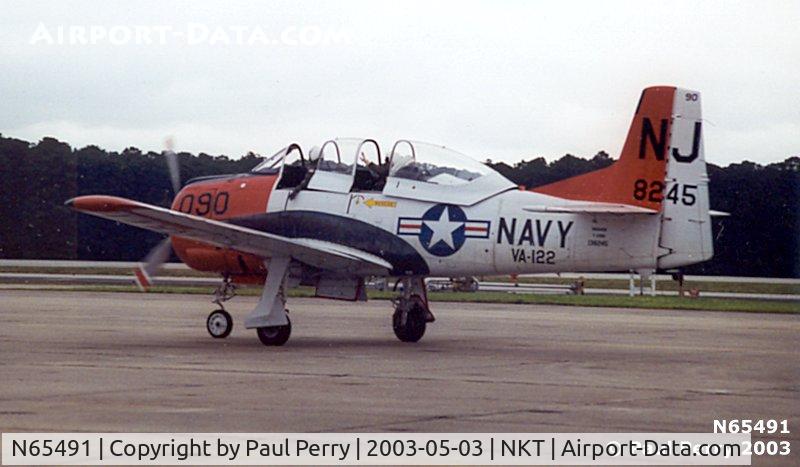 N65491, North American T-28B Trojan C/N 200-316 (138245), The Trojan taxis by, to rest and take in the show