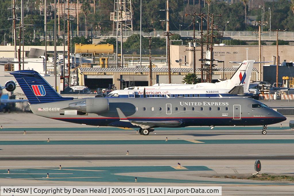 N944SW, 2003 Bombardier CRJ-200LR (CL-600-2B19) C/N 7764, United Express N944SW taxiing to the terminal after arrival.