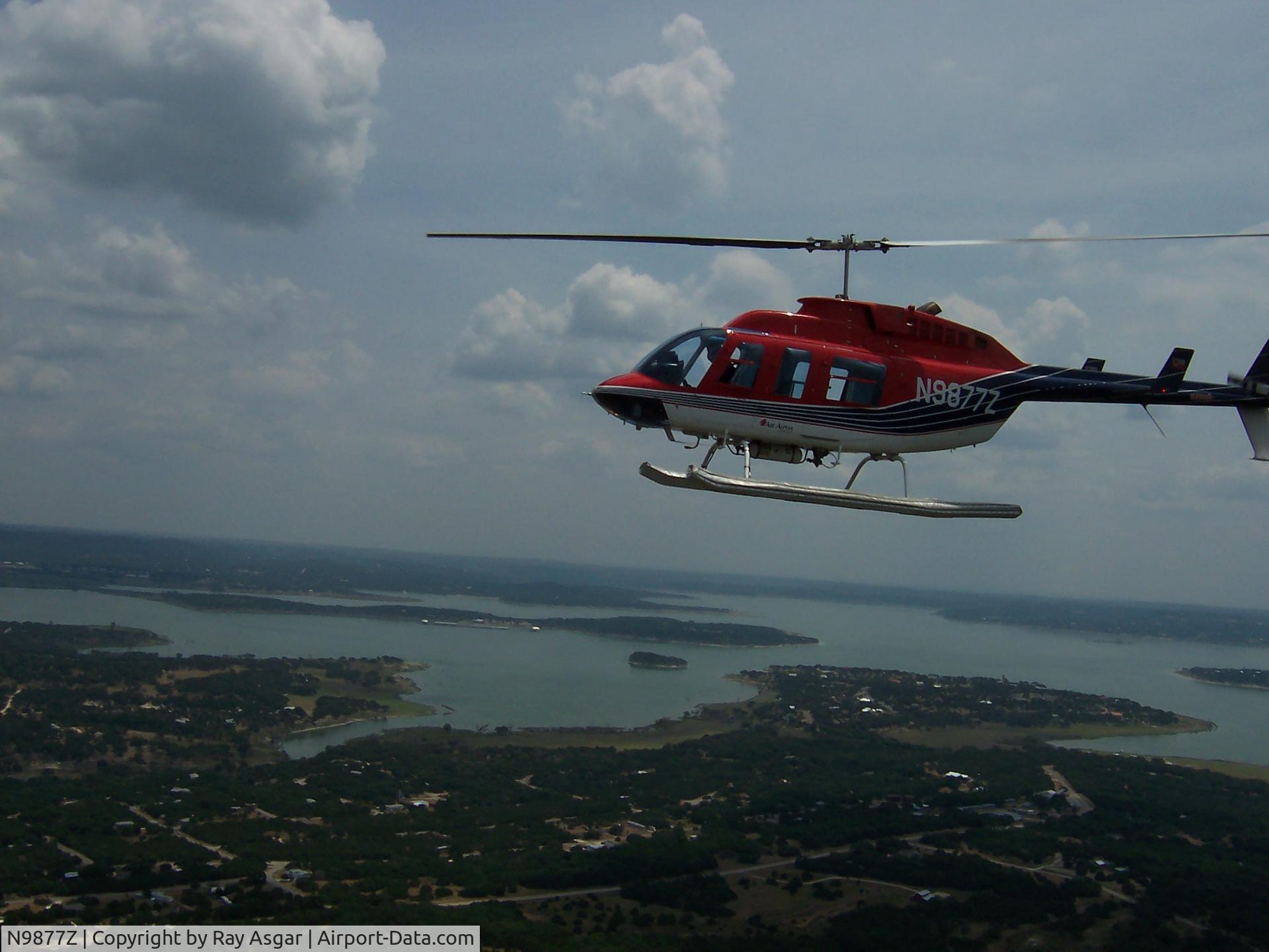 N9877Z, Bell 206L LongRanger C/N 45339, over lake travis , Austin , Texas