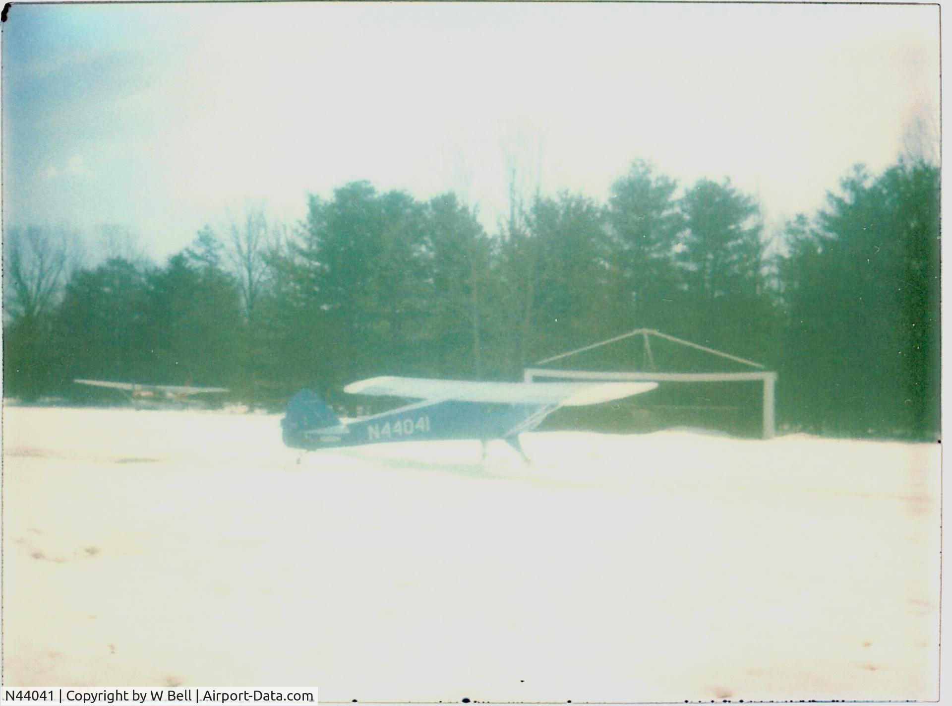 N44041, 1946 Taylorcraft BC12-D C/N 9841, on skiis