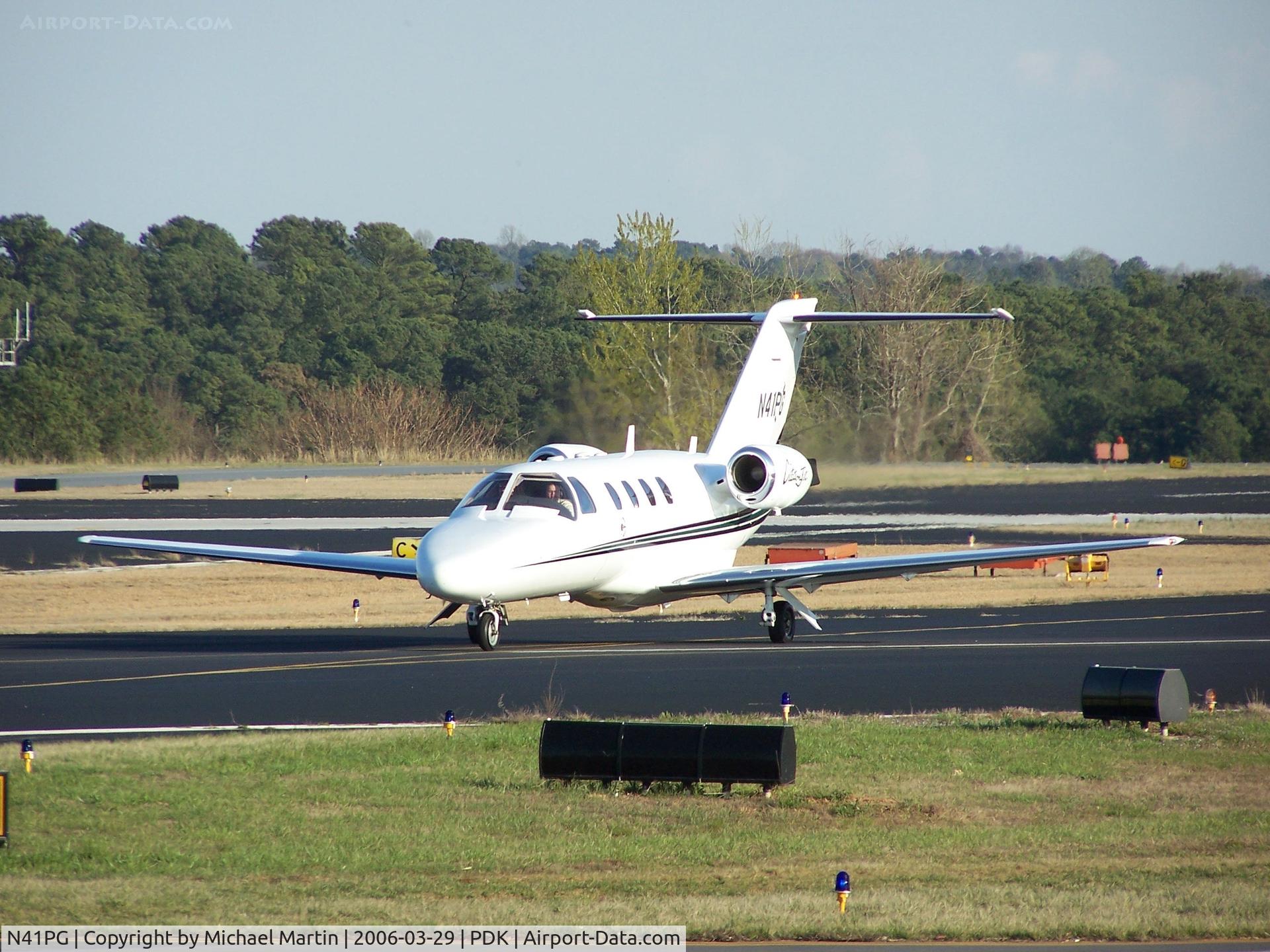 N41PG, 1997 Cessna 525 C/N 525-0175, Taxing from Mercury Air Service