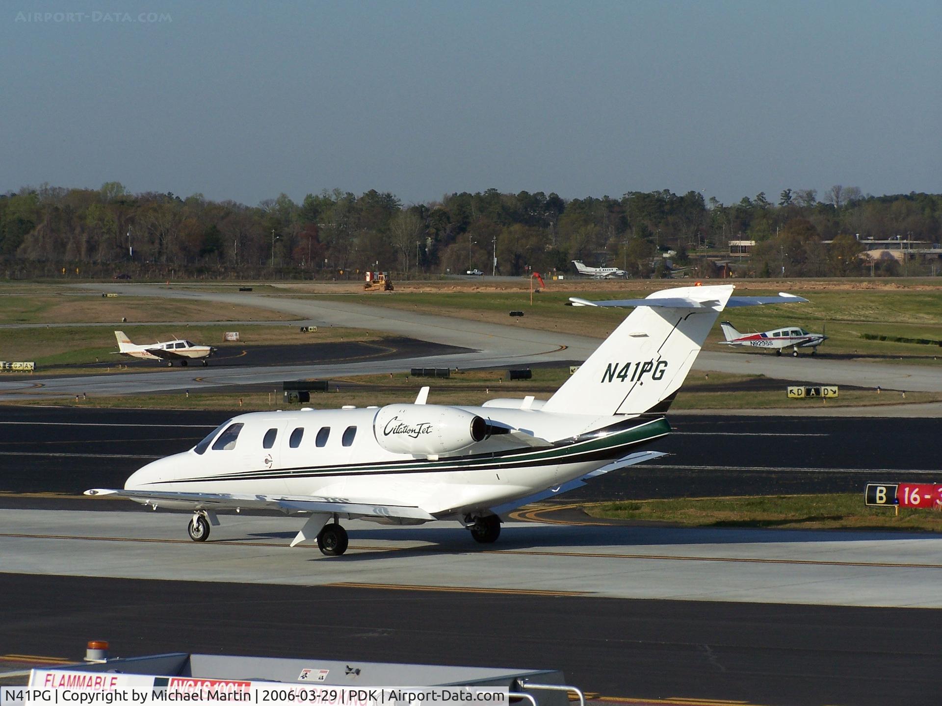 N41PG, 1997 Cessna 525 C/N 525-0175, Taxing to Runway 20L - Busy day!
