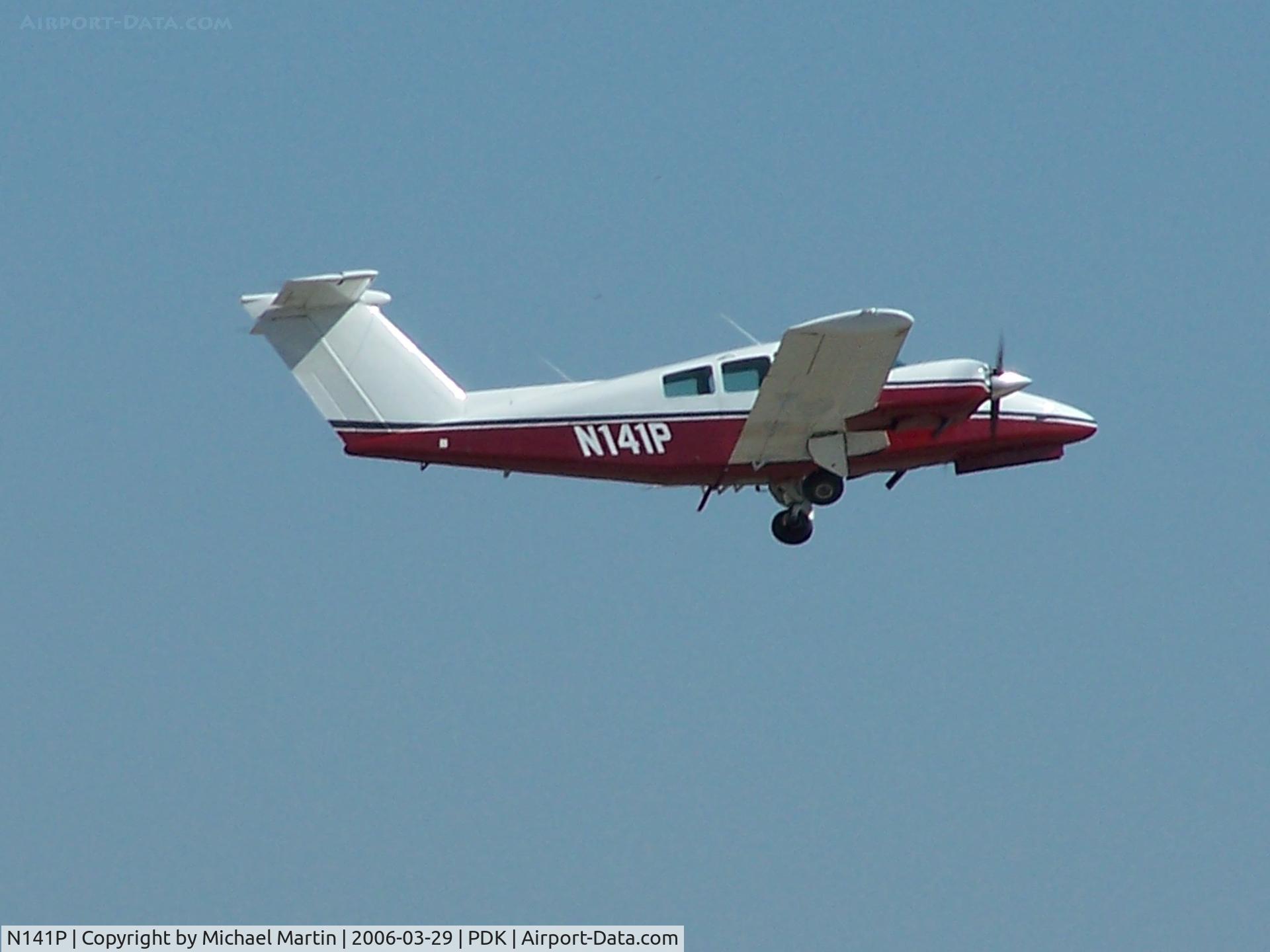 N141P, 1979 Beech 76 Duchess C/N ME-237, Departing PDK - Starting to rotate gear.