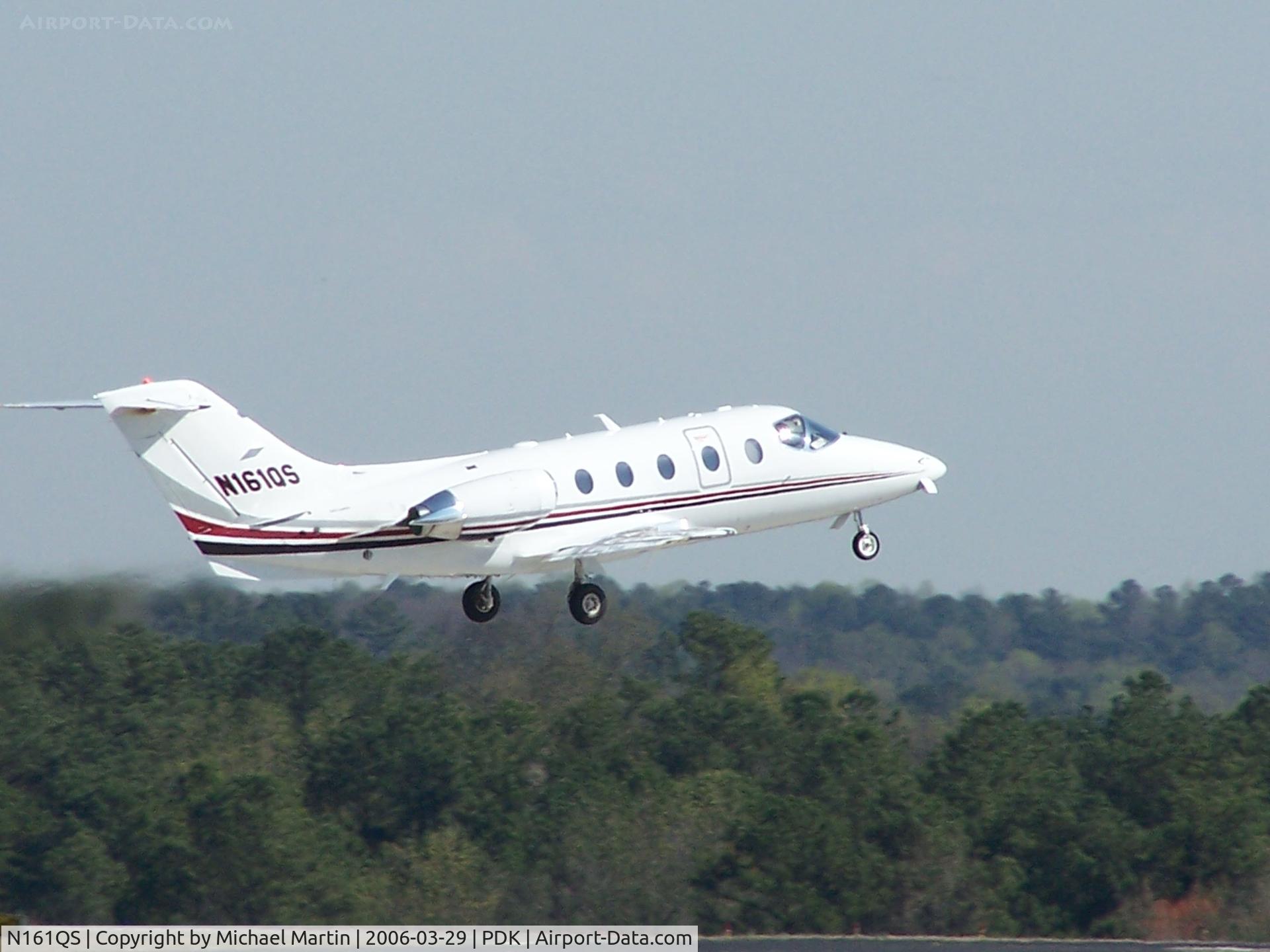 N161QS, Raytheon Aircraft Company 400A C/N RK-435, Departing PDK - Starting to rotate gear.