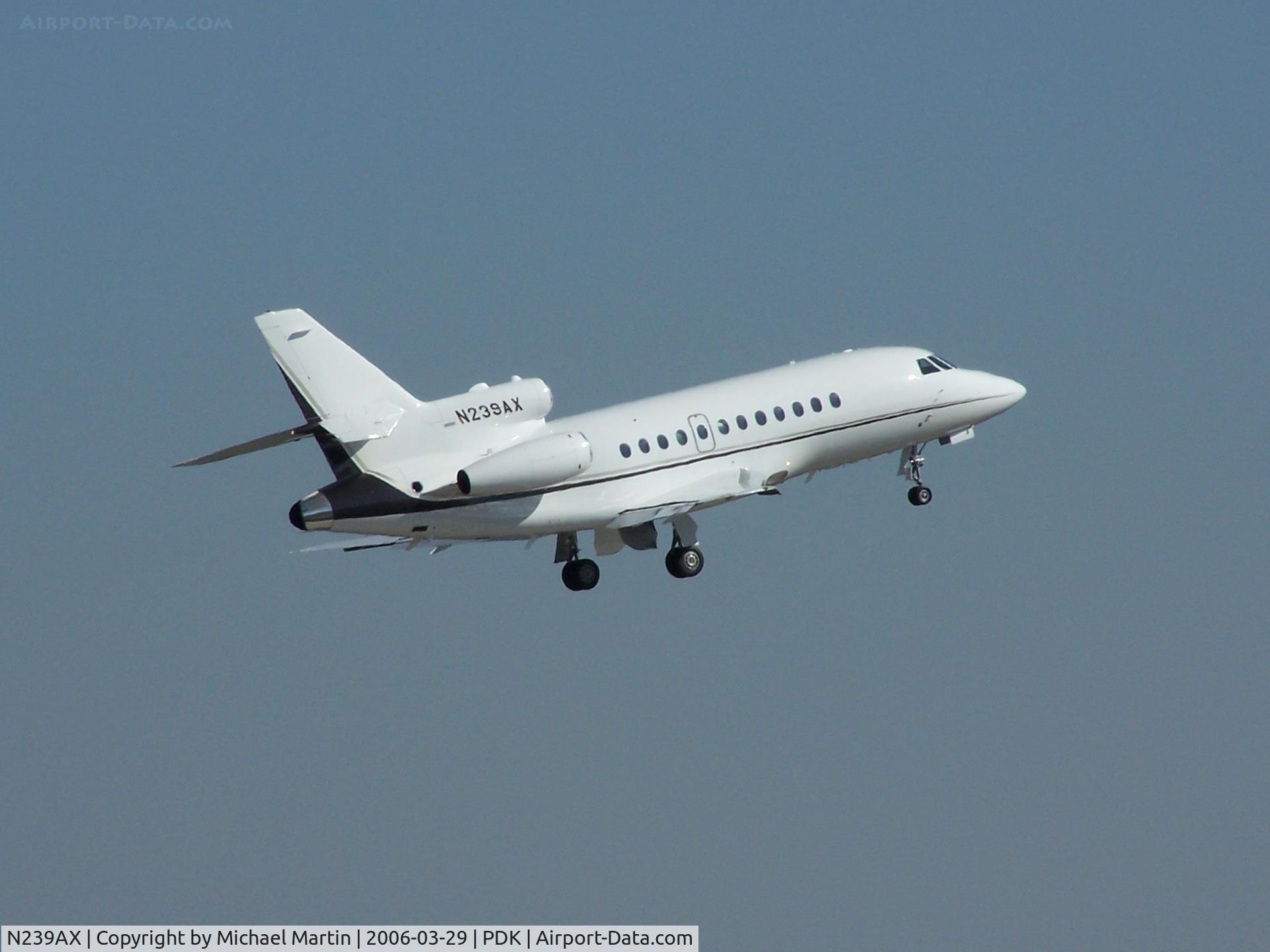 N239AX, 1987 Dassault Falcon 900 C/N 39, Departing PDK - Starting to rotate gear.