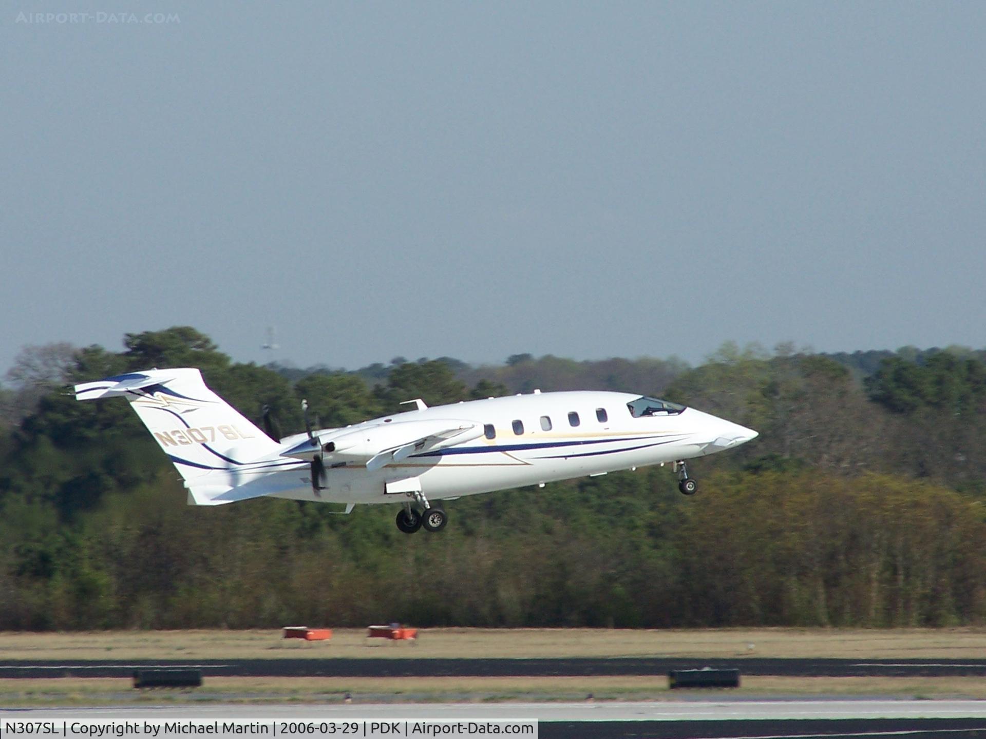 N307SL, 2004 Piaggio P-180 Avanti C/N 1091, Departing PDK enroute to BWG.