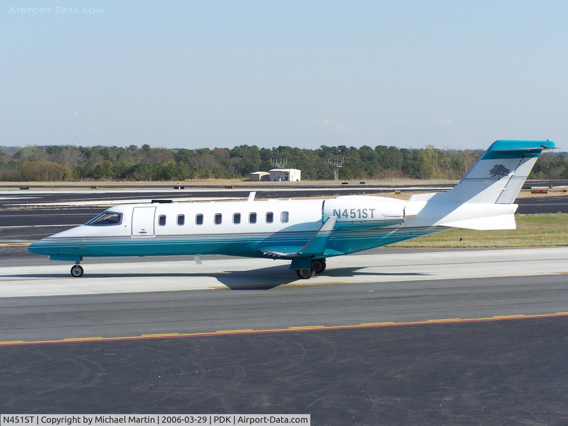 N451ST, 2002 Learjet 45 C/N 200, Taxing from Mercury Air Service