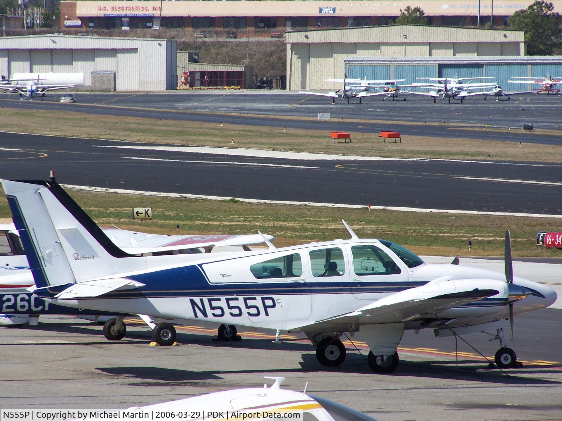 N555P, 1966 Beech C55 Baron (95-C55) C/N TE-164, Tied down @ Epps