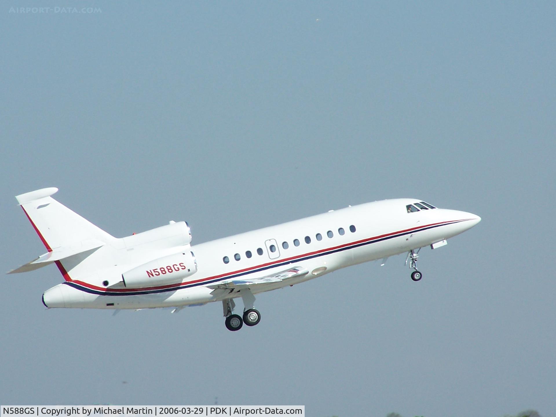 N588GS, 2002 Dassault Falcon 900EX C/N 104, Departing PDK - Starting to rotate gear.