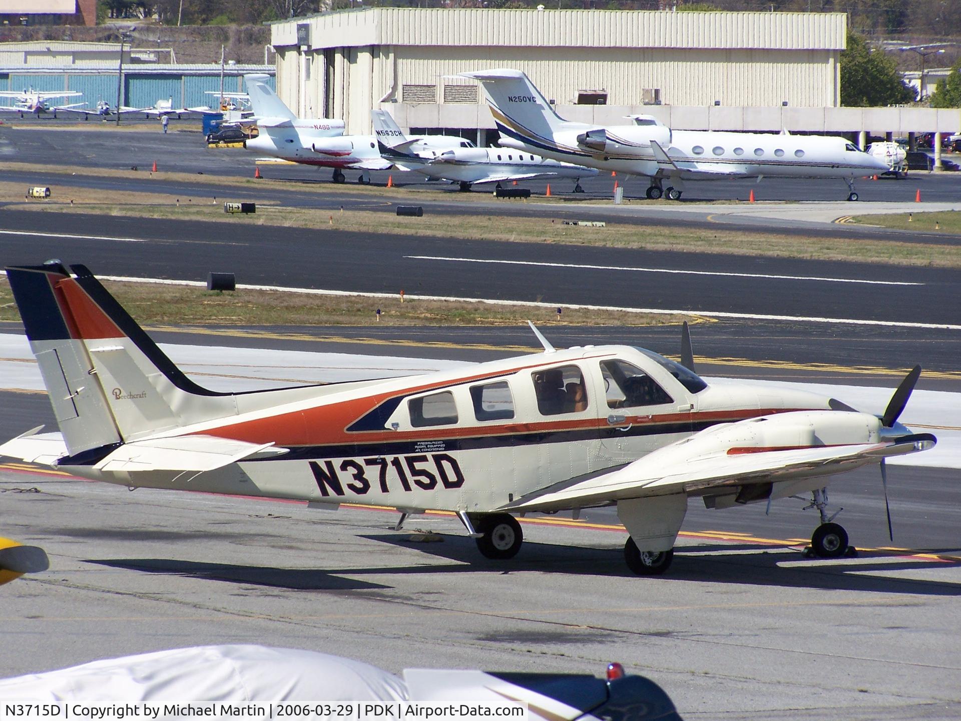 N3715D, 1980 Beech 58P Baron C/N TJ-324, Tied Down @ Mercury Air Center with other A/C