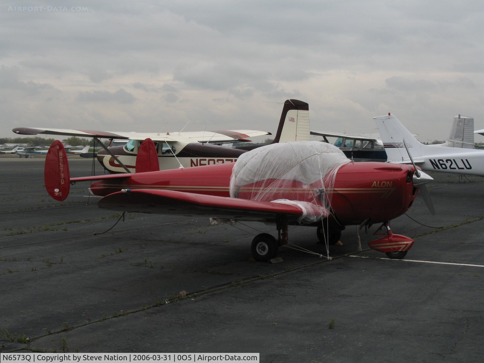 N6573Q, 1965 Alon A2 Aircoupe C/N A-73, Out in the rain @ University Airport, Davis, CA