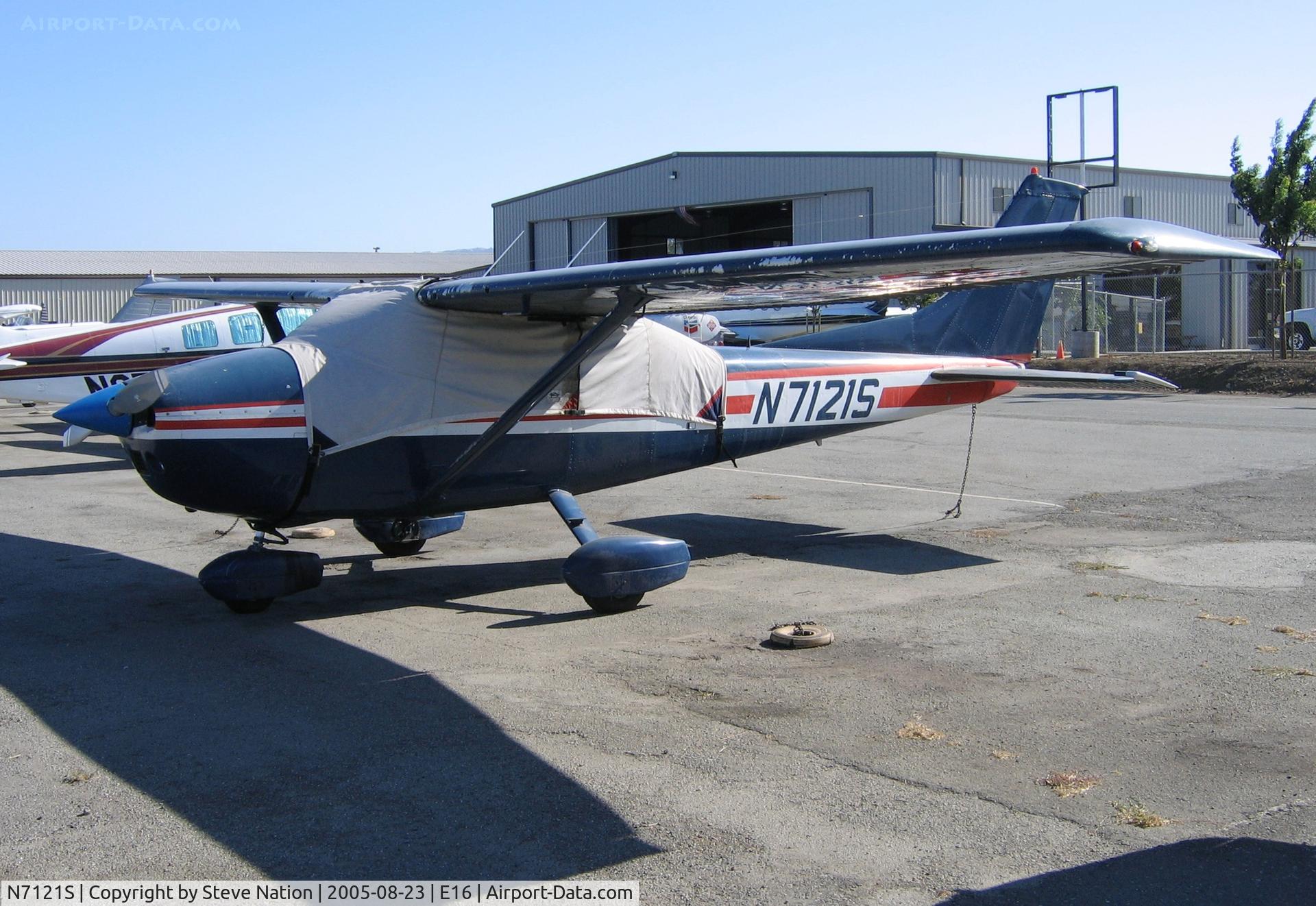 N7121S, 1976 Cessna 182P Skylane C/N 18265065, Dark blue Cessna 182P in summer sun at South County Airport, San Martin, CA
