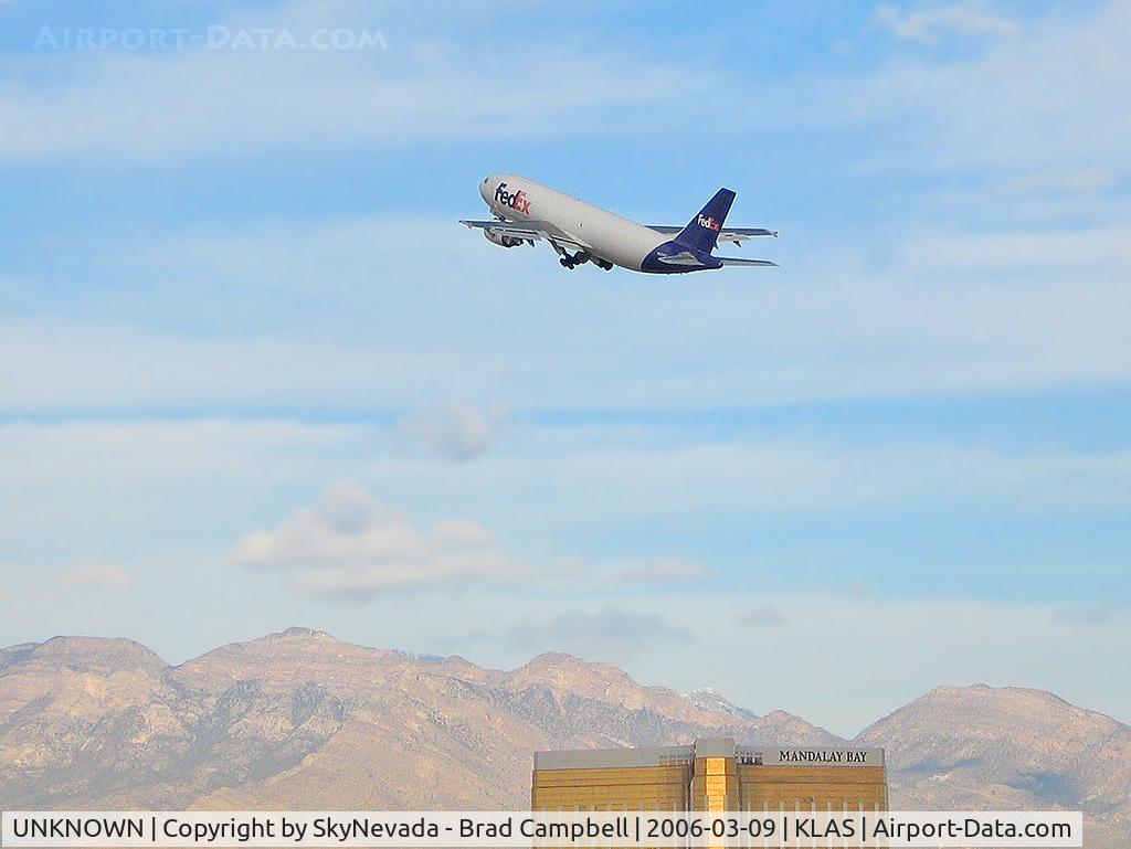 UNKNOWN, Airliners Various C/N Unknown, FedEx over Mandalay Bay - Spring Mountains in background
