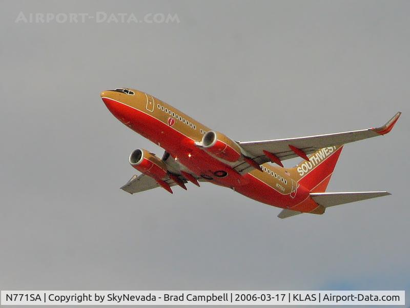 N771SA, 2000 Boeing 737-7H4 C/N 27879, Southwest Airlines / 2000 Boeing 737-7H4 / Not a super good pic...taken thru my Orion f/5 80mm telescope @ 10x with a Canon G5 Powershot set on Auto.