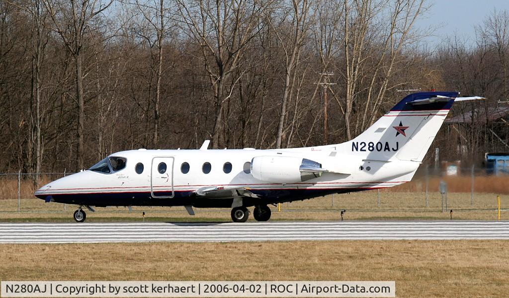 N280AJ, 1997 Raytheon Aircraft Company 400A C/N RK-164, taking off for a charter to PBI