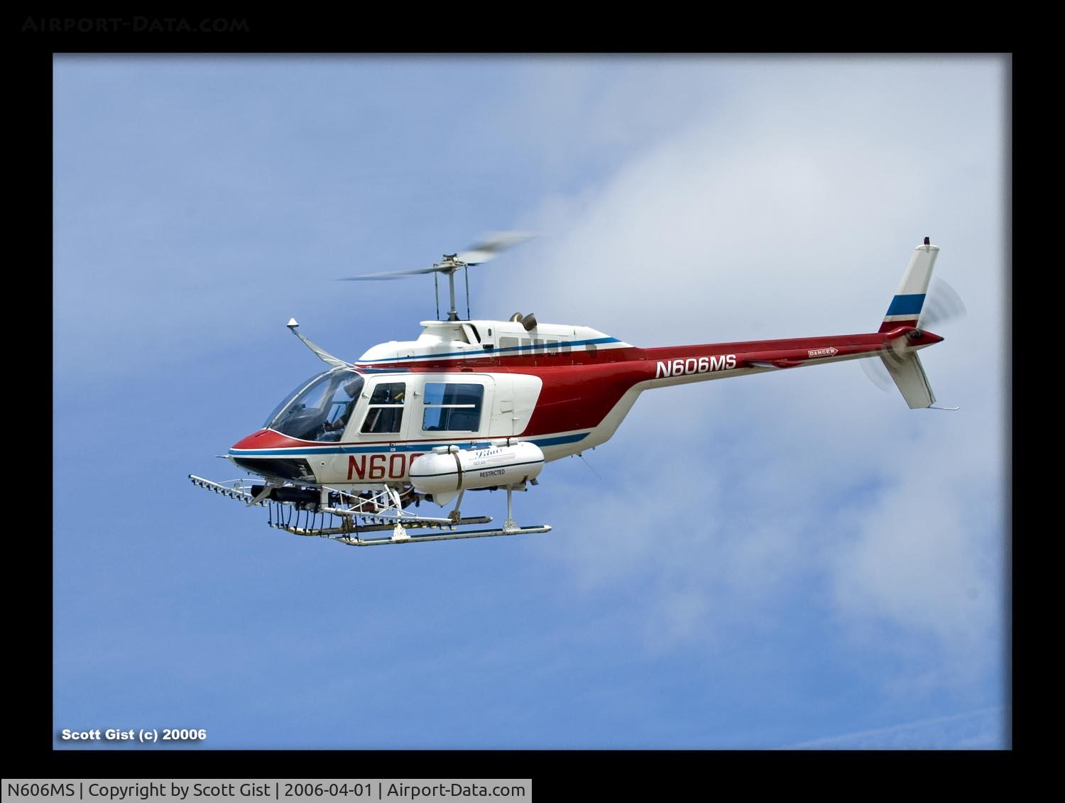 N606MS, 1977 Bell 206B C/N 2183, Doing what she does best. Dusting!