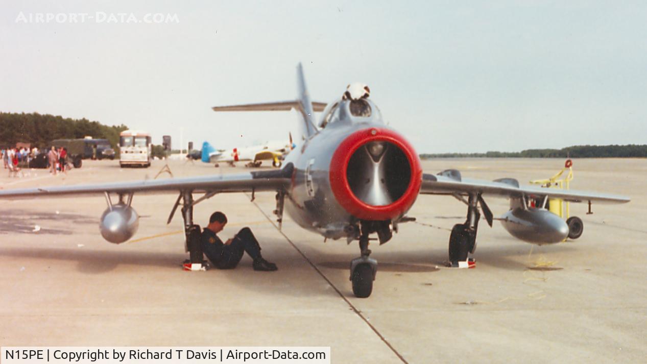 N15PE, Mikoyan-Gurevich MiG-15bis C/N 122073, Mig 15 Pilot takes a break at Seymour Johnson AFB