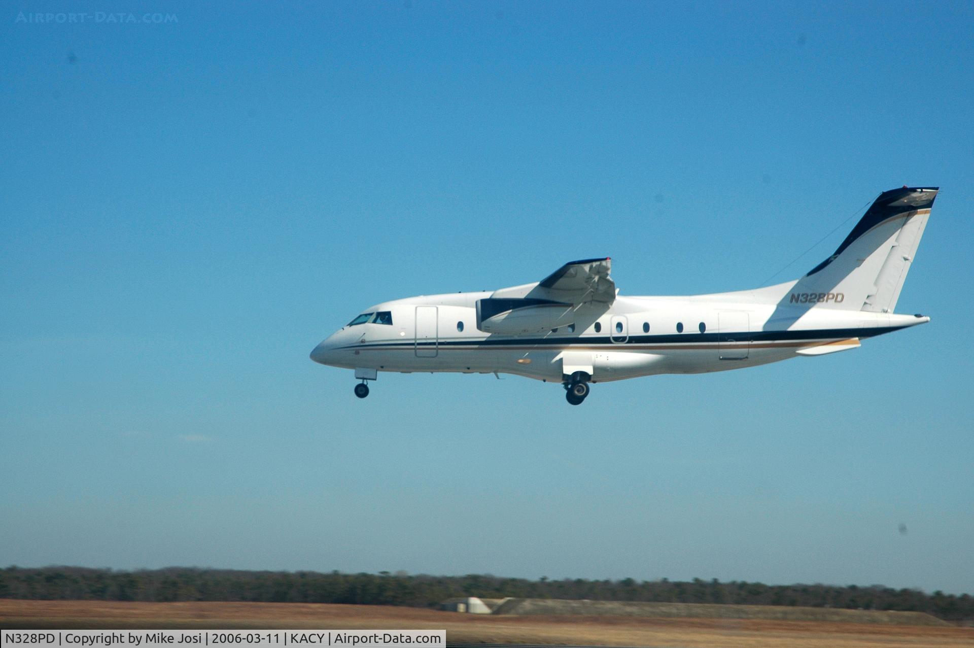 N328PD, 2000 Fairchild Dornier 328-300 328JET C/N 3105, on short final at Atlantic City International KACY