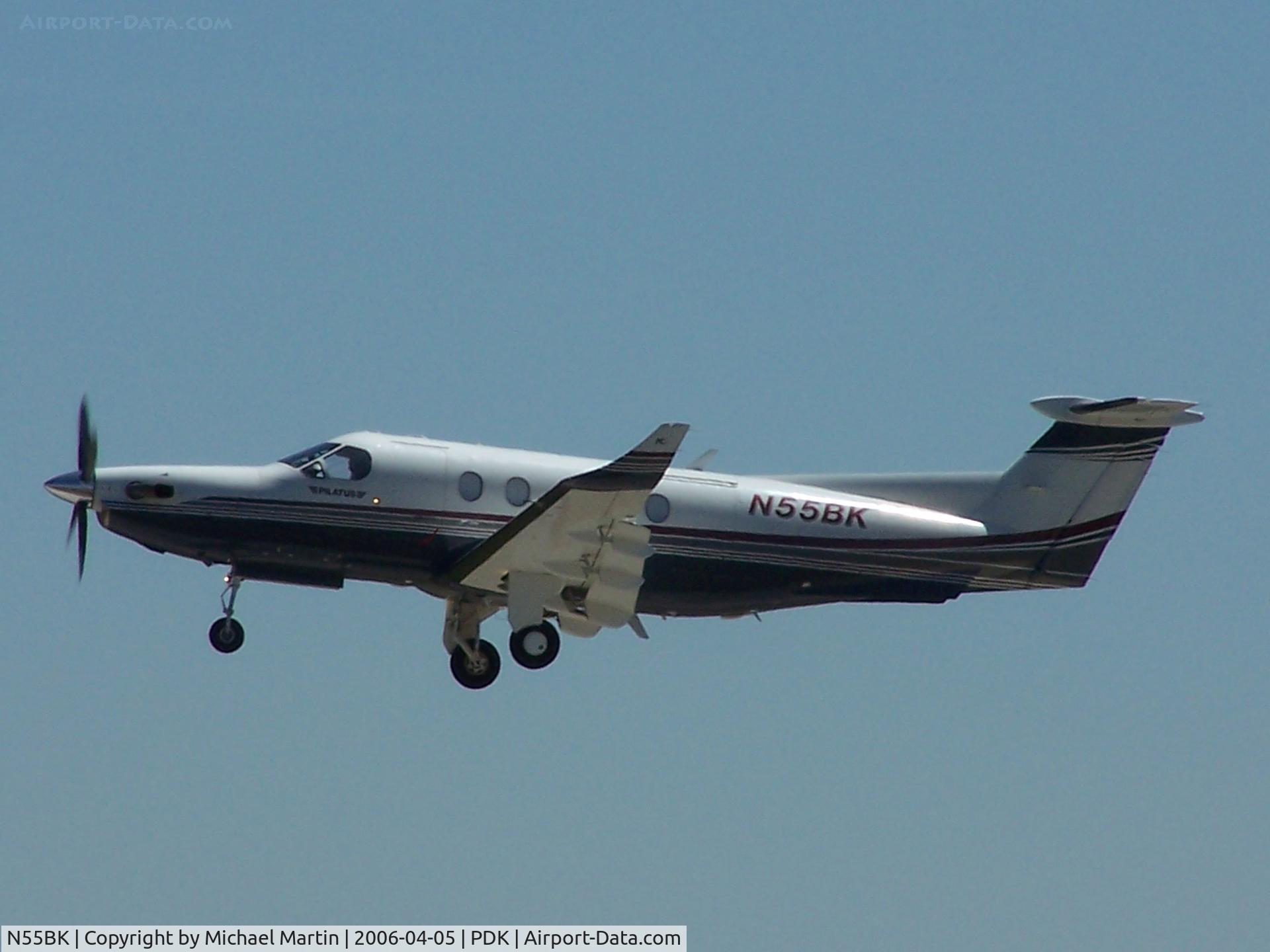 N55BK, 1996 Pilatus PC-12 C/N 160, Departing PDK - Starting to rotate gear.