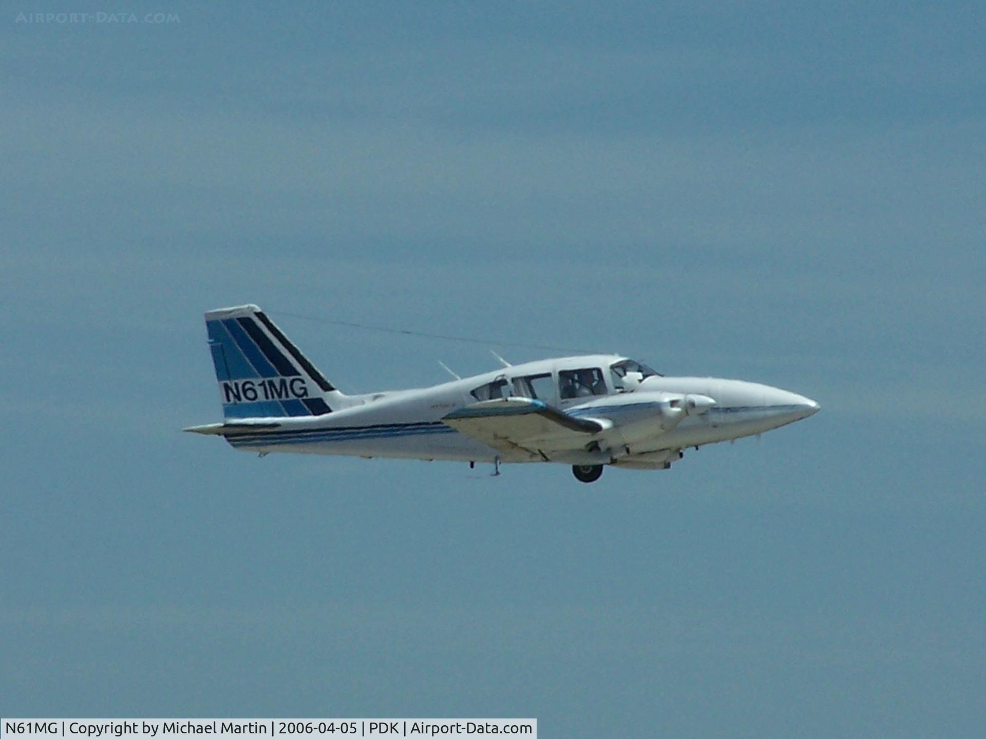 N61MG, 1974 Piper PA-23-250 C/N 277405285, Departing PDK - Gear Up!