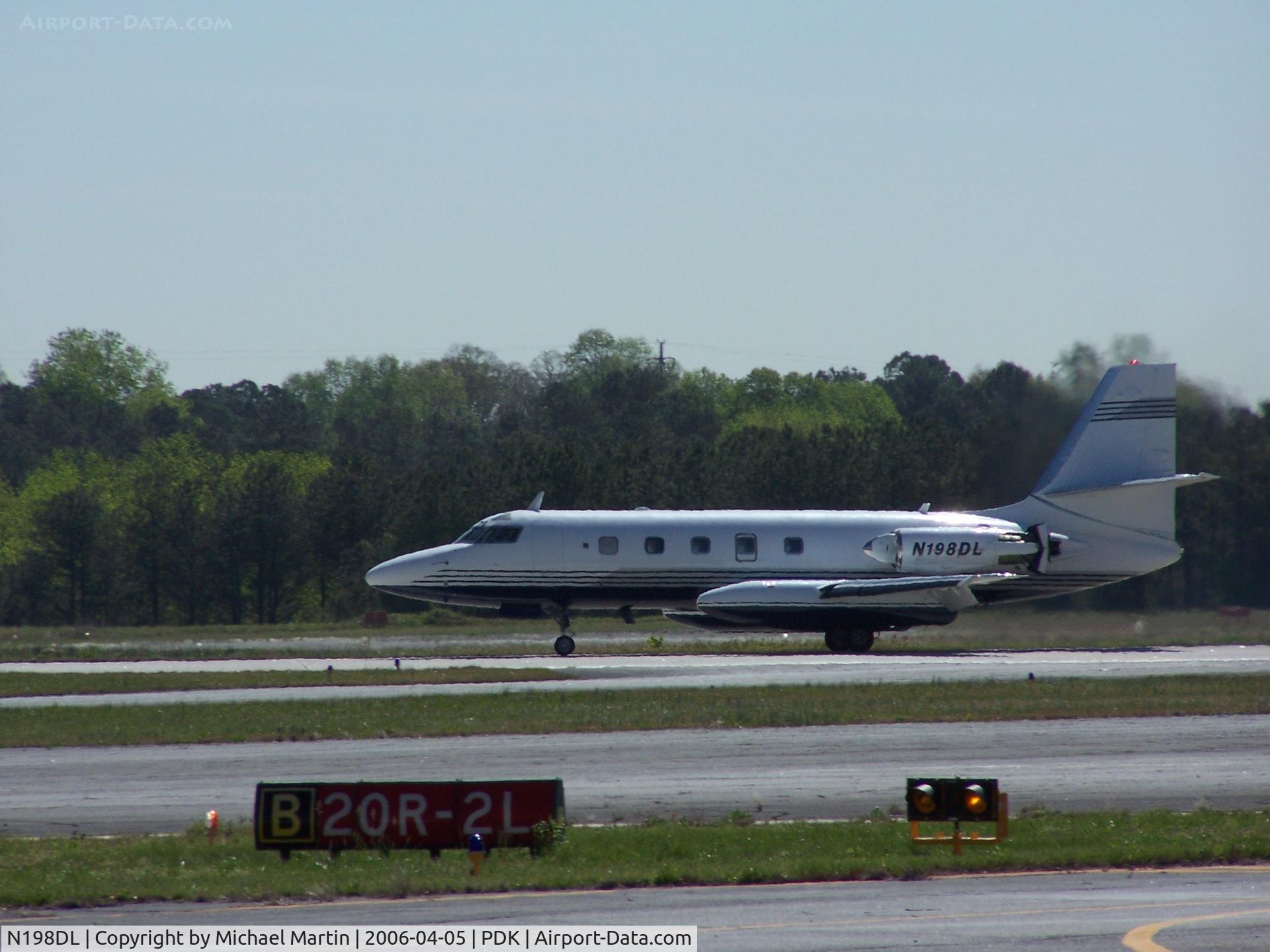 N198DL, 1966 Lockheed L-1329 JetStar 731 C/N 5083, Landing PDK on 2R with airbrakes extended
